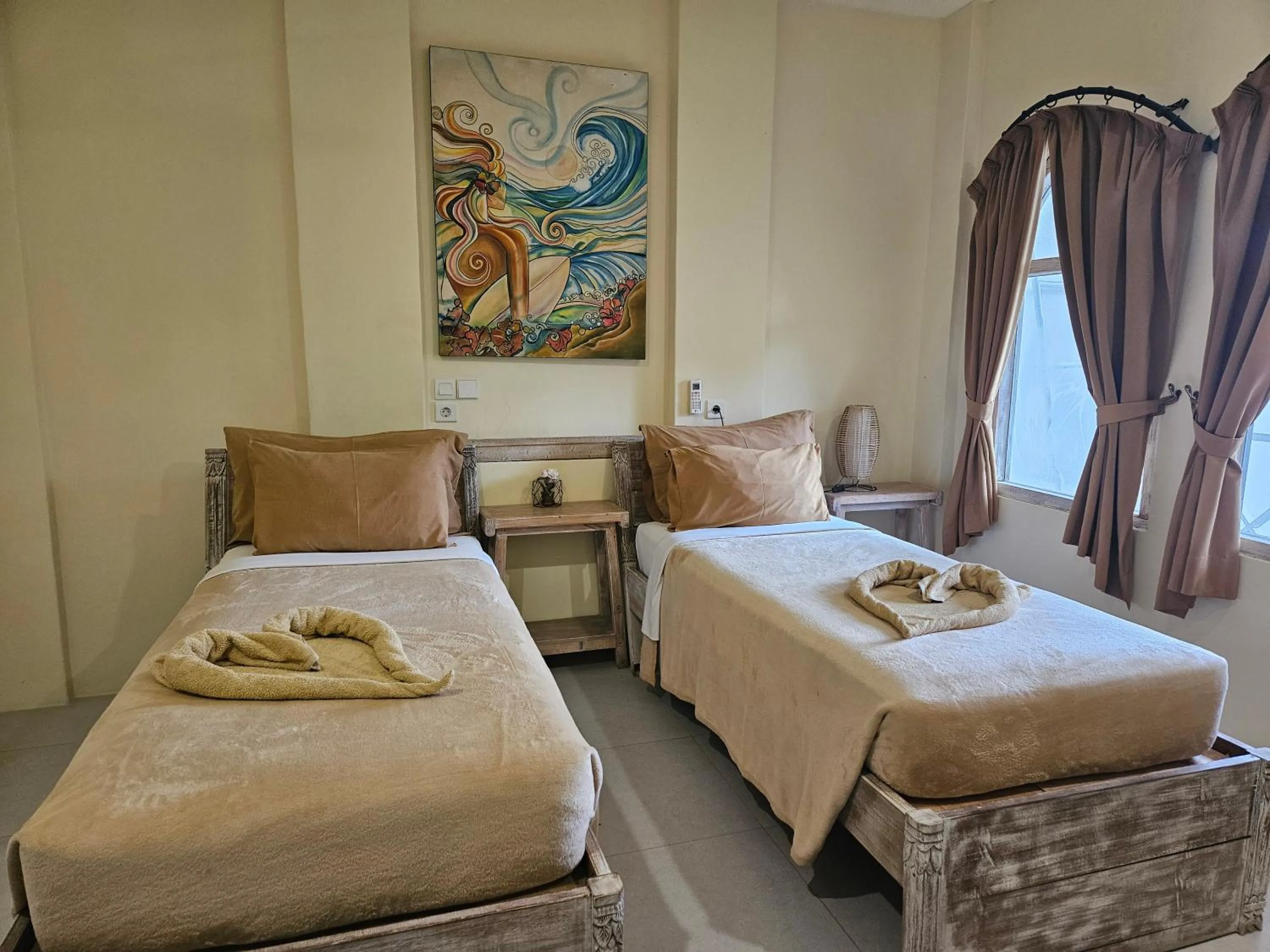 Bed in ISLA INDAH RETREAT boutique hotel