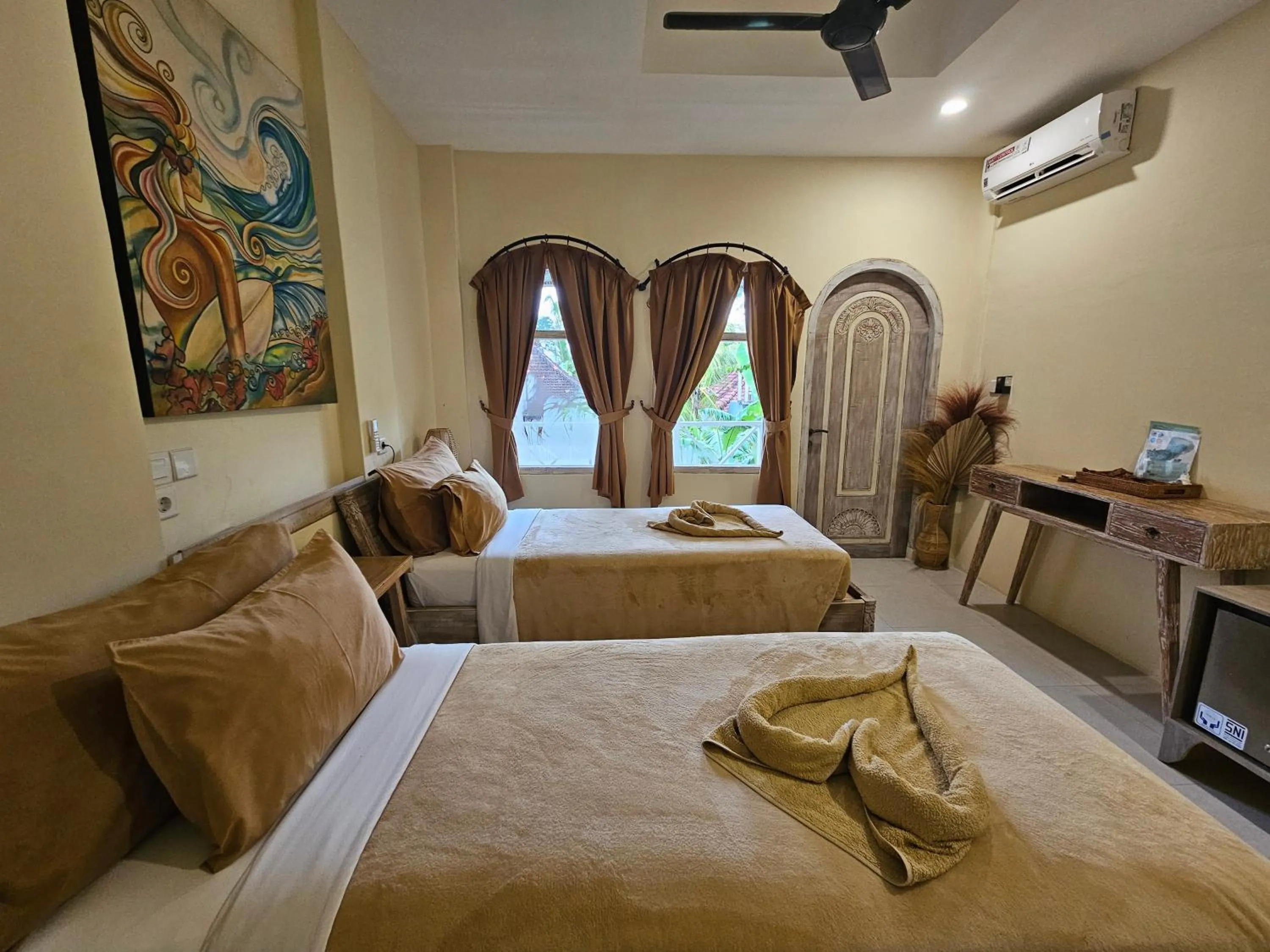 Bed in ISLA INDAH RETREAT boutique hotel