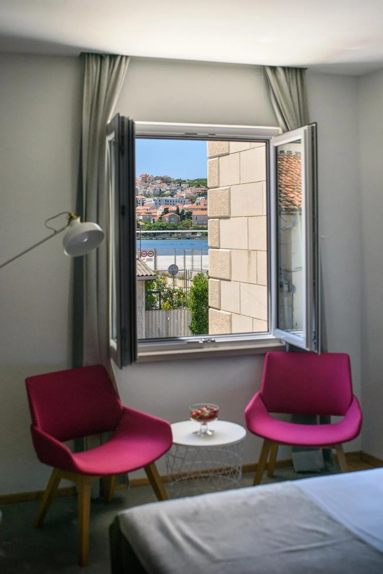 Seating area, Bed in Ora Luxury Rooms