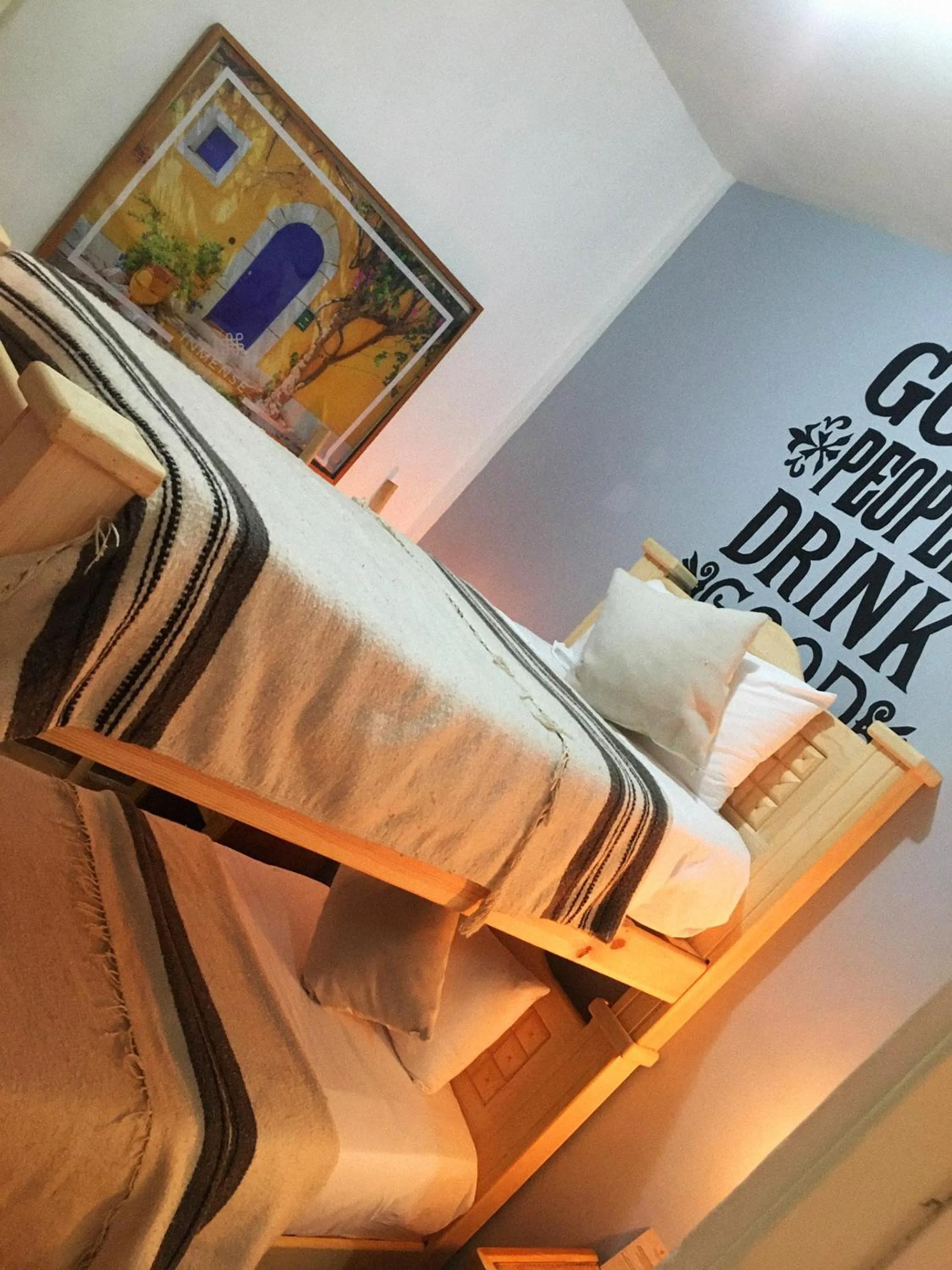 Bedroom in Mala Vecindad Beer Hotel