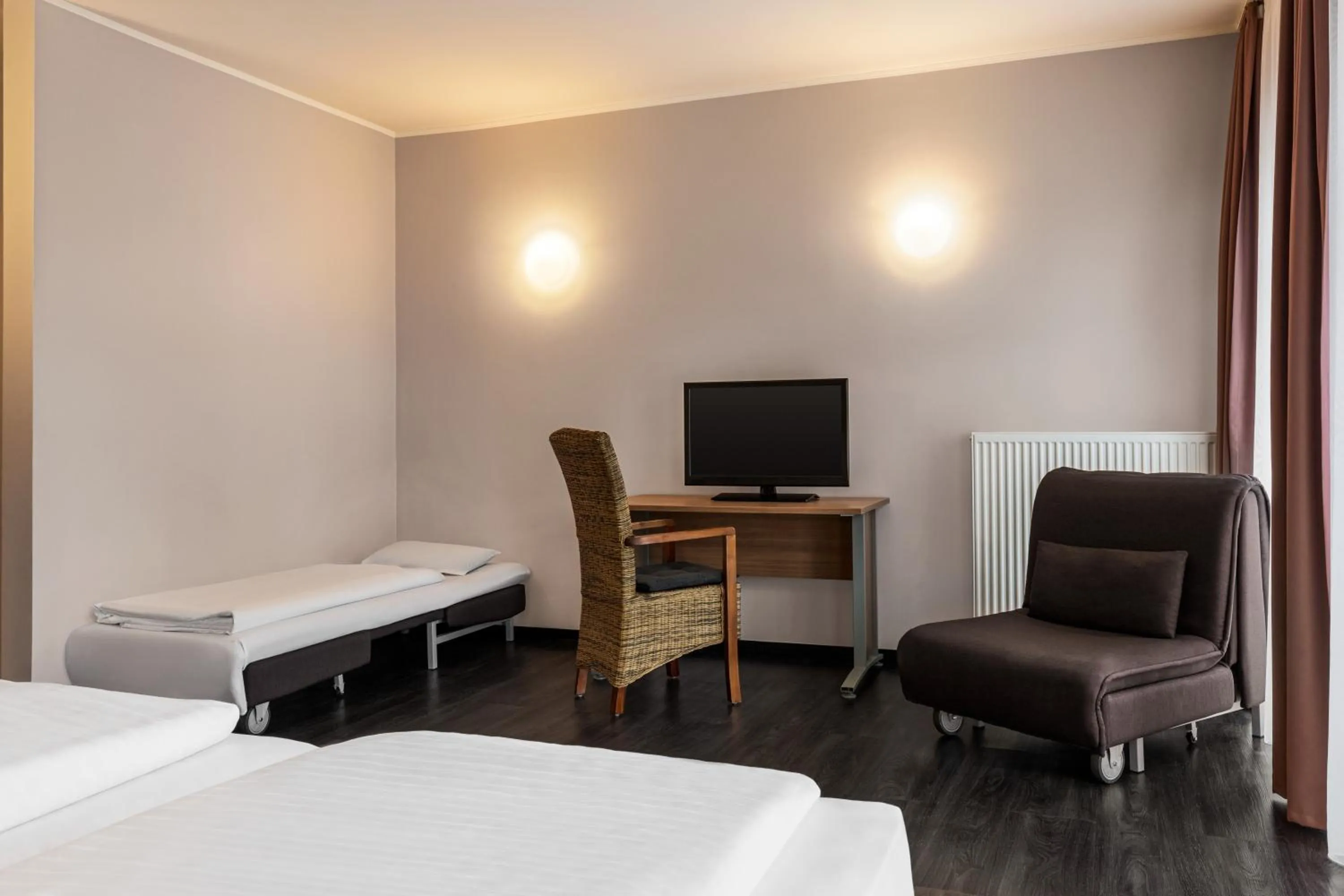 Photo of the whole room, Bed in Amedia Express Bielefeld, Trademark Collection by Wyndham