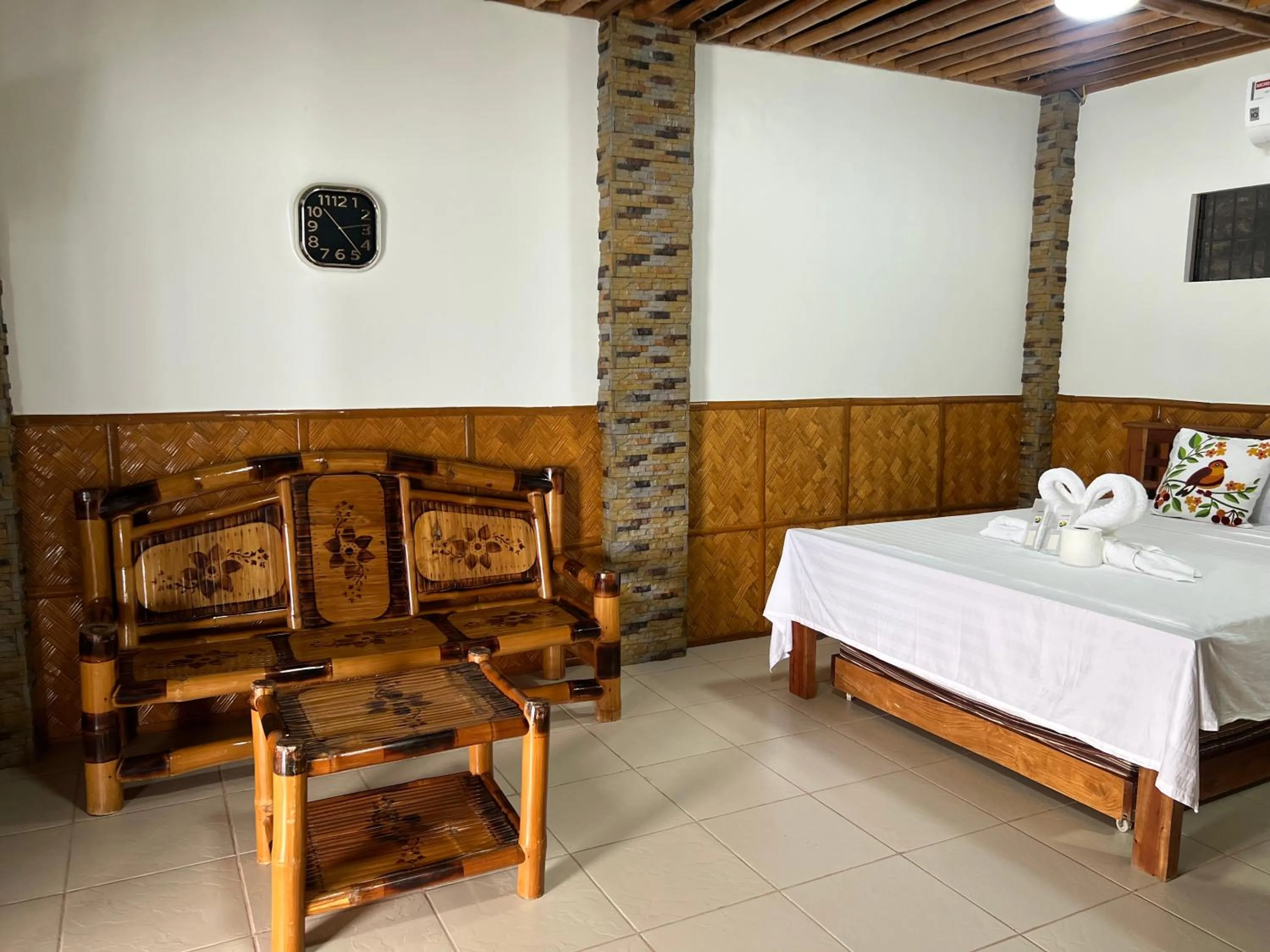 Seating area, Bed in Villa de Pico Highland Beach Resort