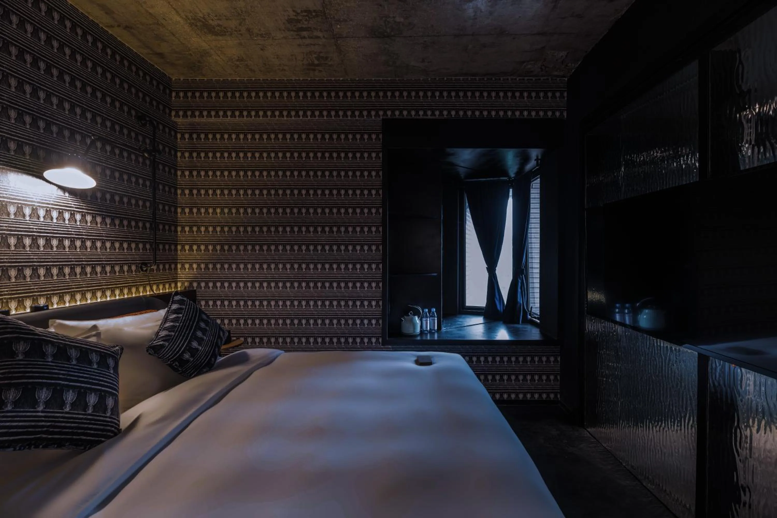 Bed in Neobridge Hotel