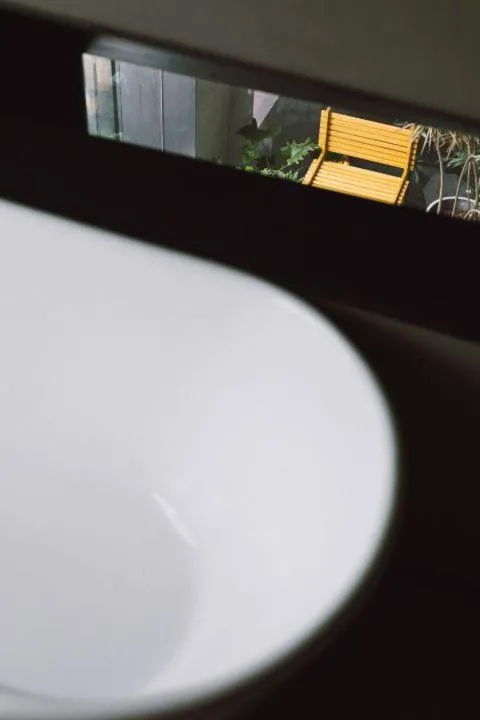 Bathroom in Neobridge Hotel