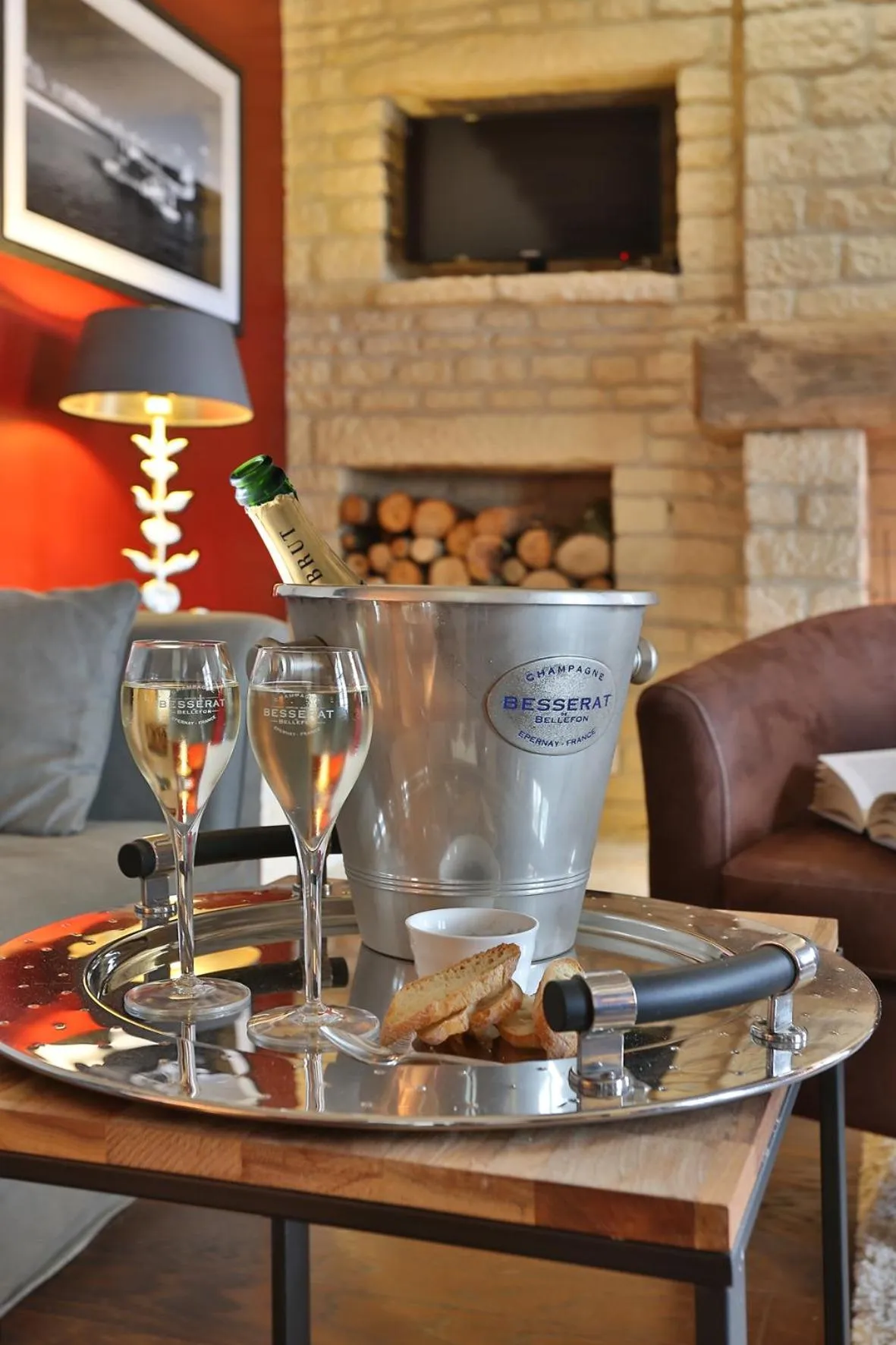 Communal lounge/ TV room in Hôtel & restaurant Le Meysset