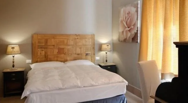 Bed in Locanda In Borgo Garnì & Wellness