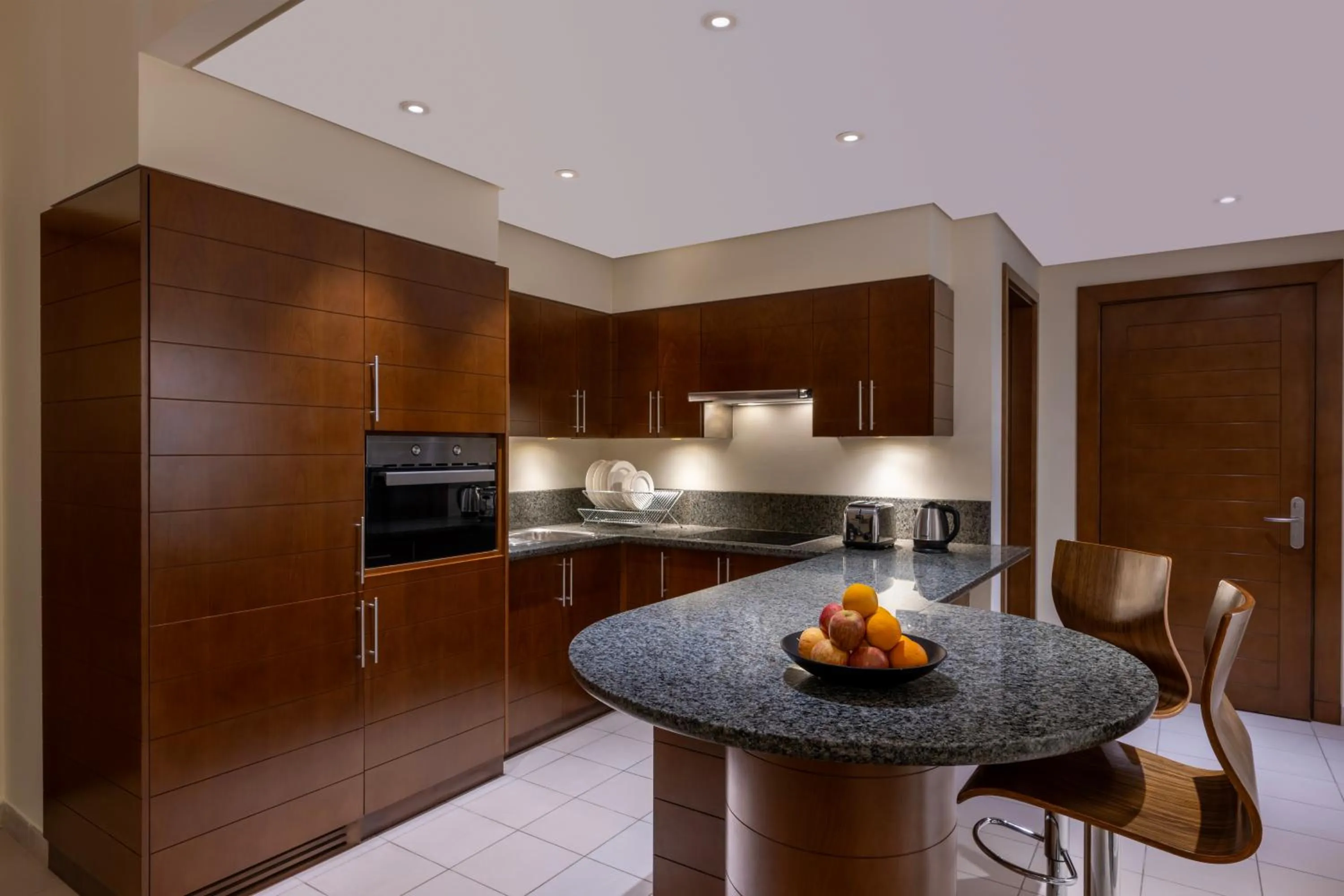 kitchen in Grand Millennium Al Wahda Executive Apartments