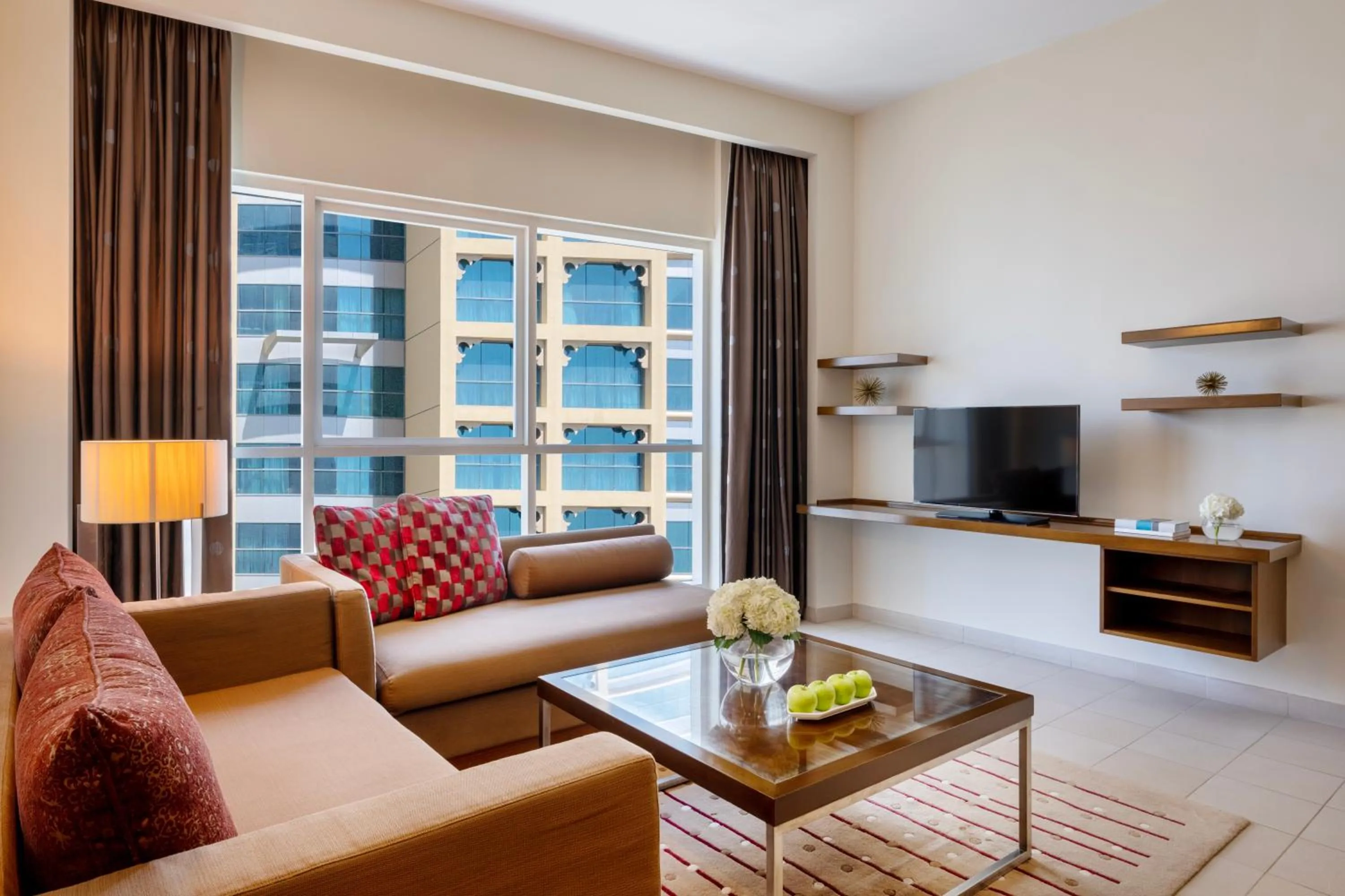 Living room in Grand Millennium Al Wahda Executive Apartments