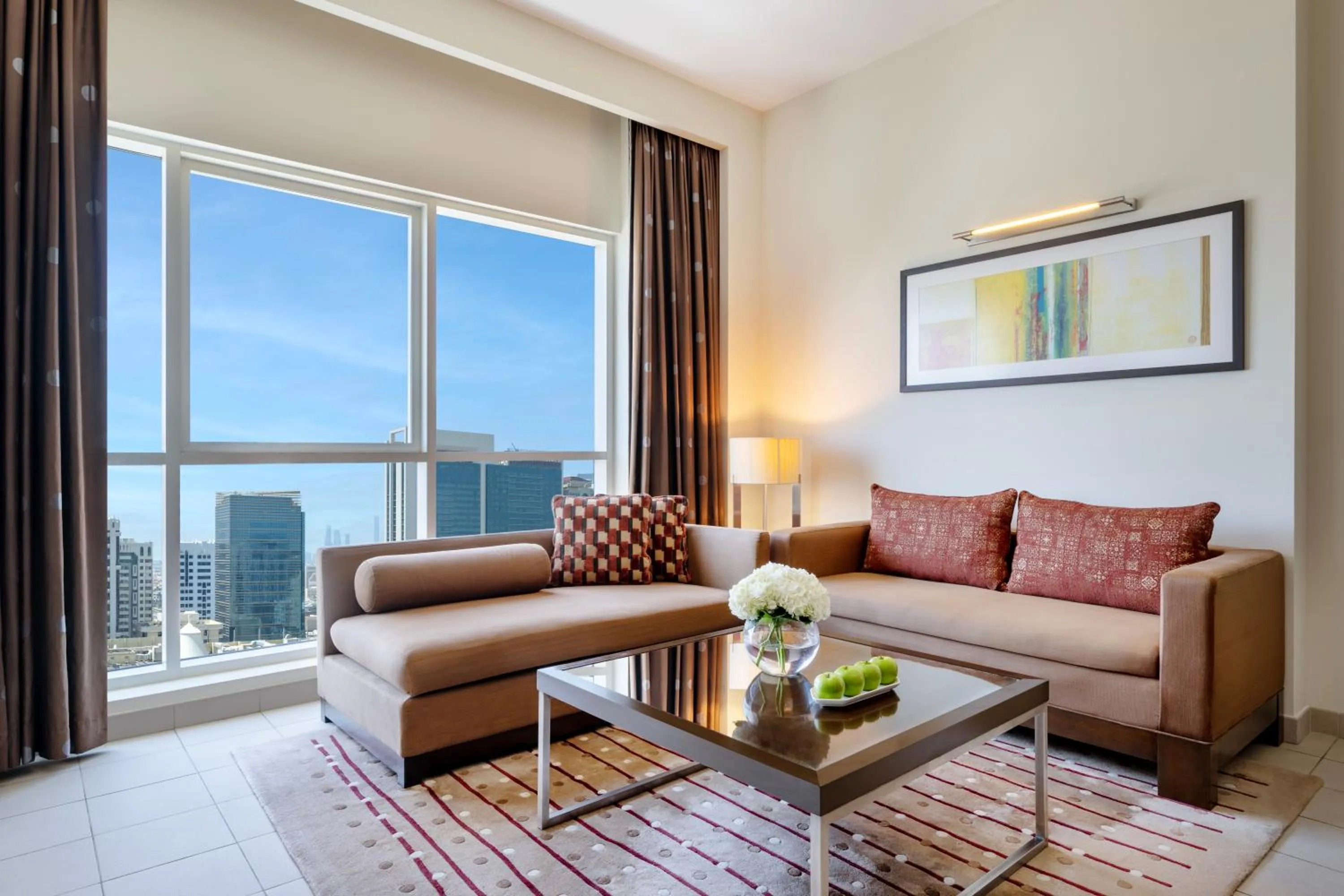 Living room in Grand Millennium Al Wahda Executive Apartments