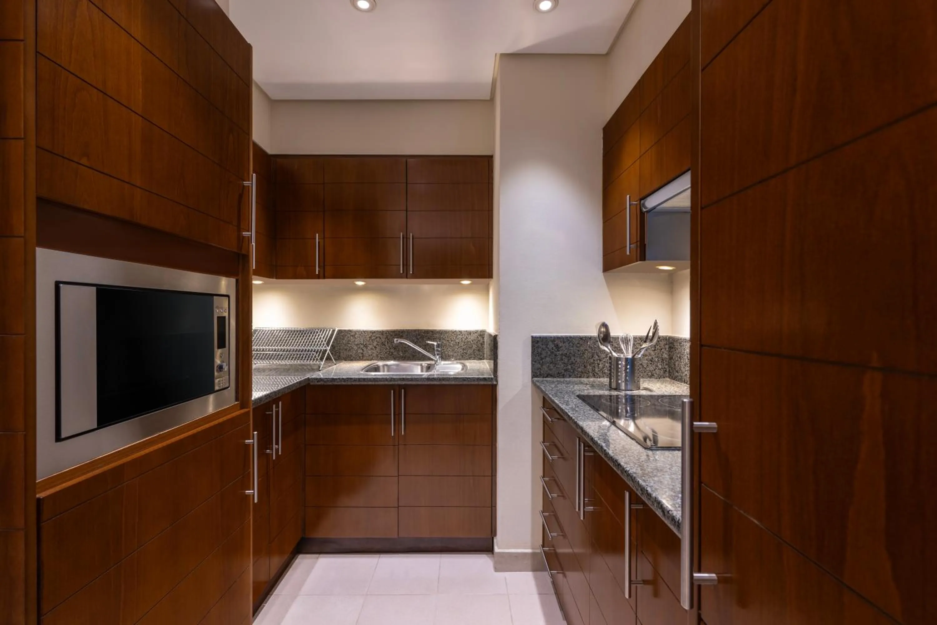 Kitchen or kitchenette in Grand Millennium Al Wahda Executive Apartments