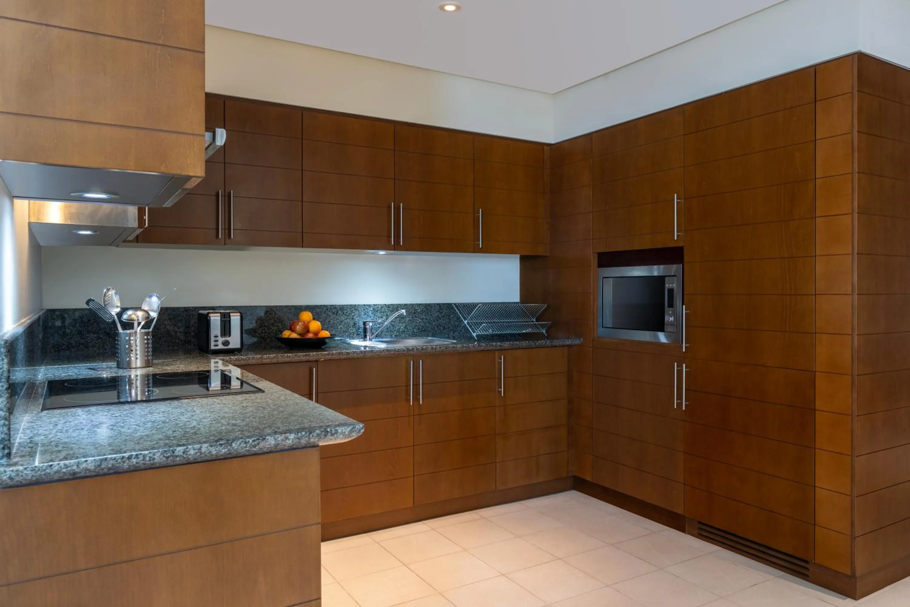 Kitchen or kitchenette in Grand Millennium Al Wahda Executive Apartments