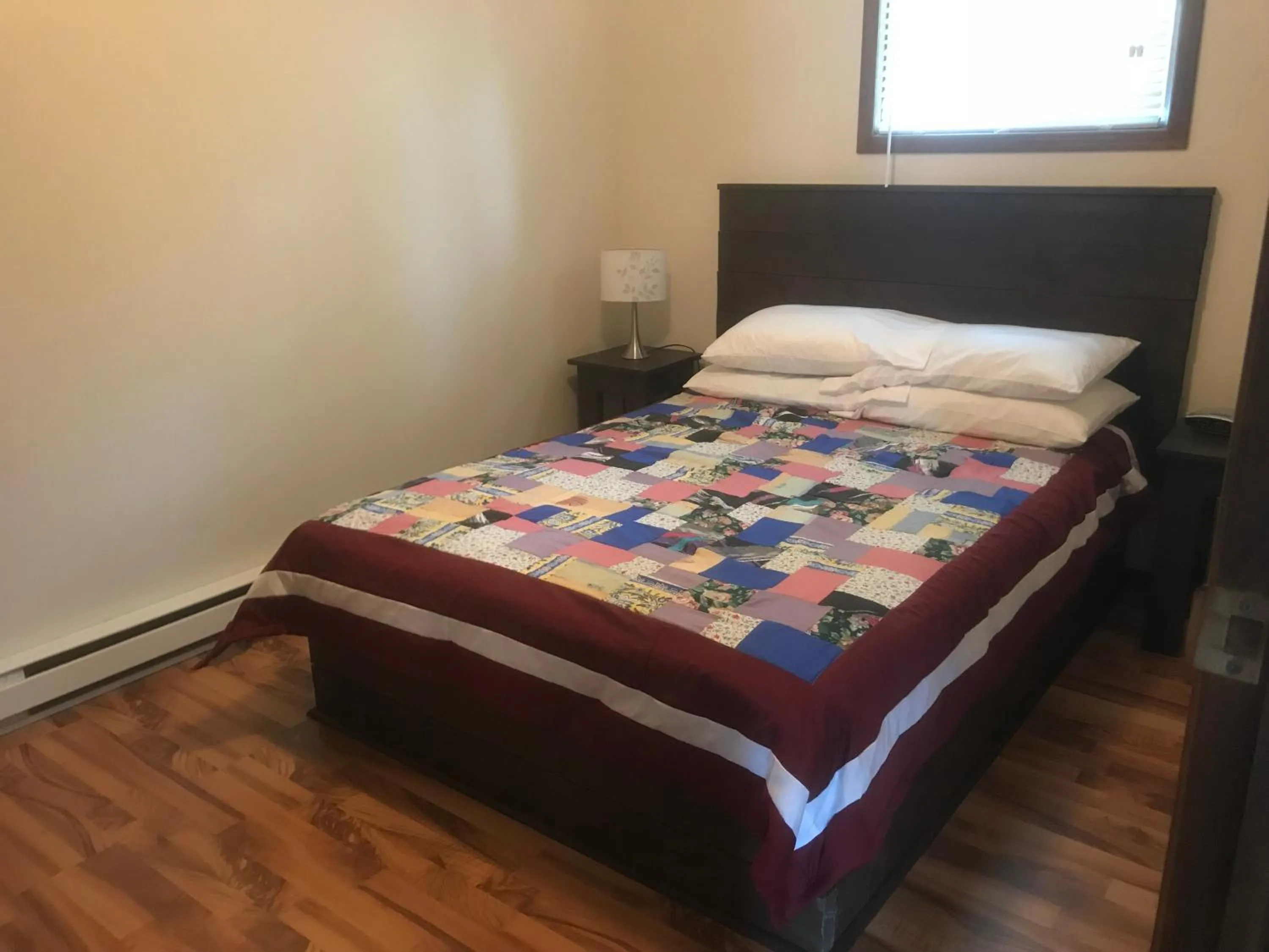 Bed in Lush's Cottages