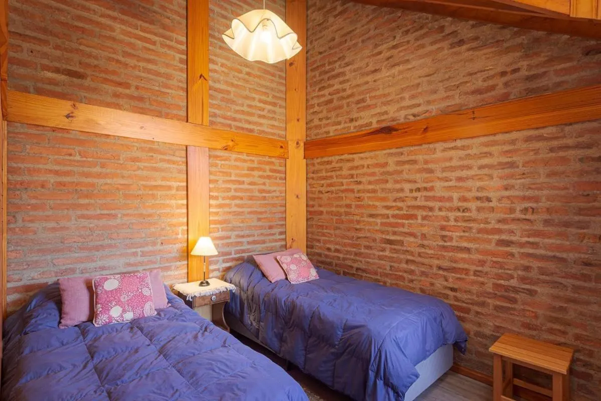 Bed in Cabañas Del Lacar