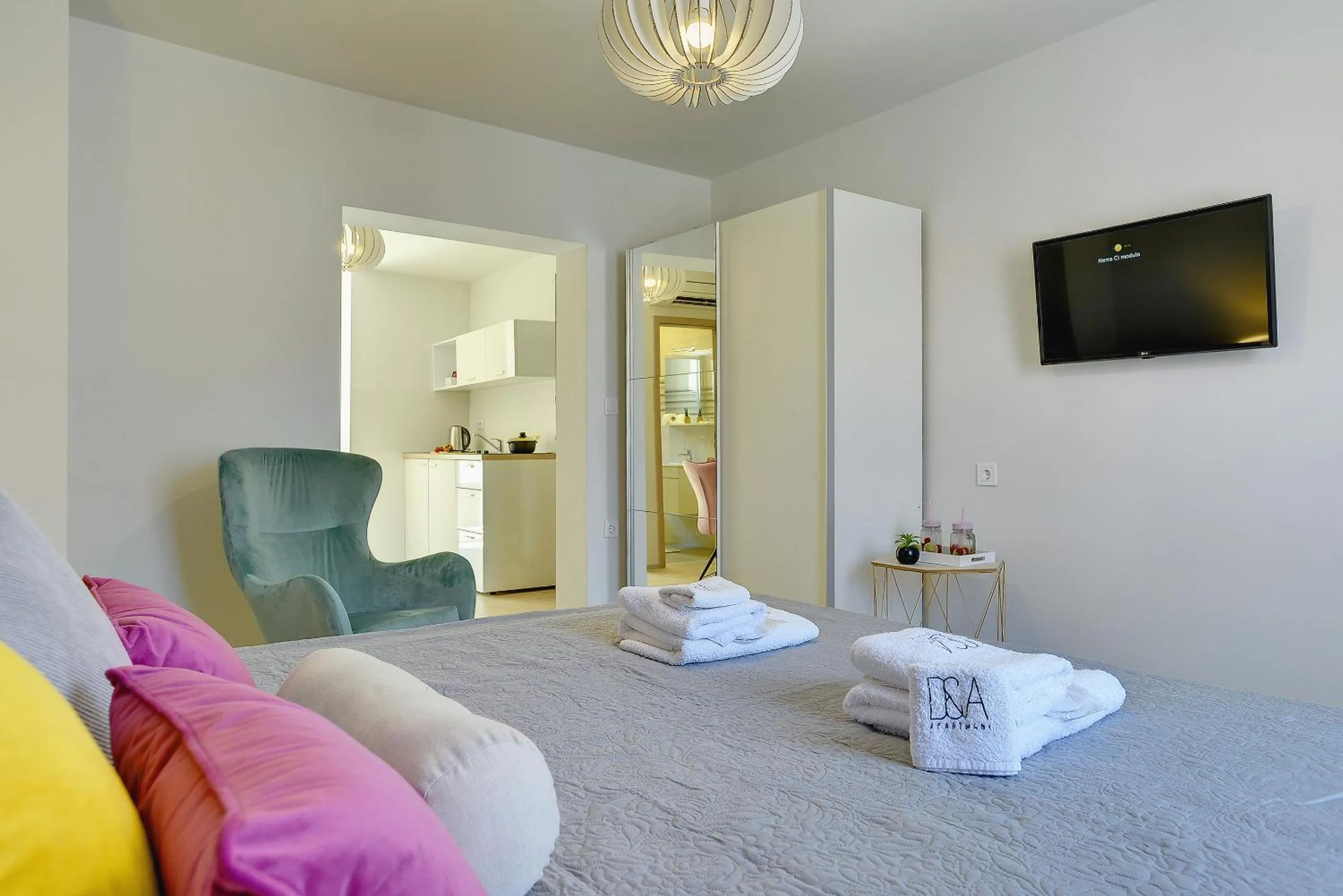 Bedroom, Bed in D&A Amphitheatre Apartments with free parking