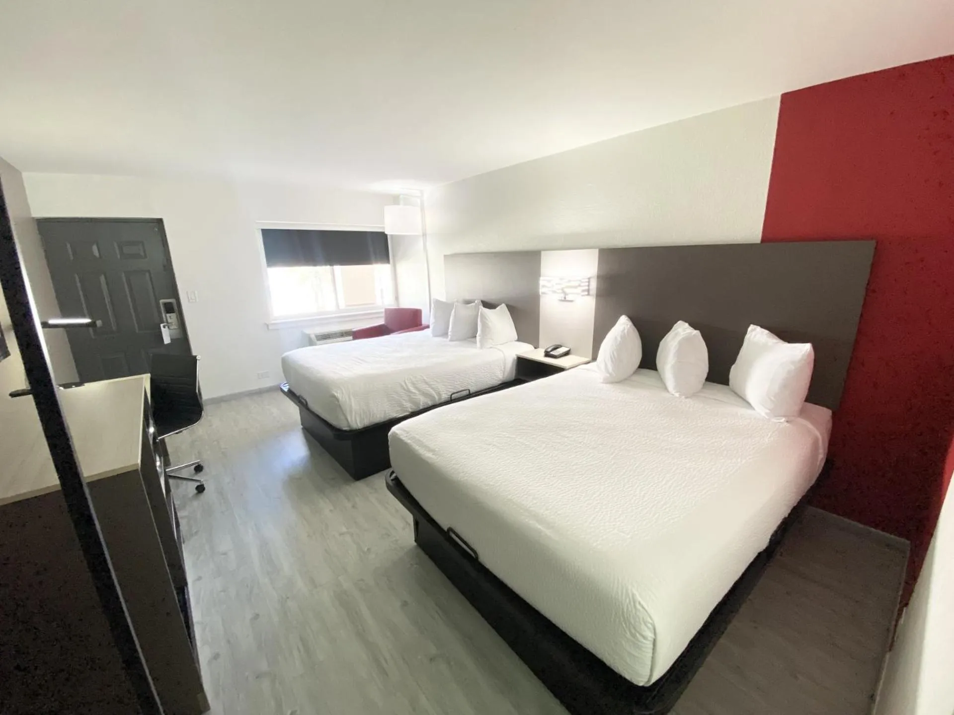 Bed in Ramada by Wyndham Tuscaloosa