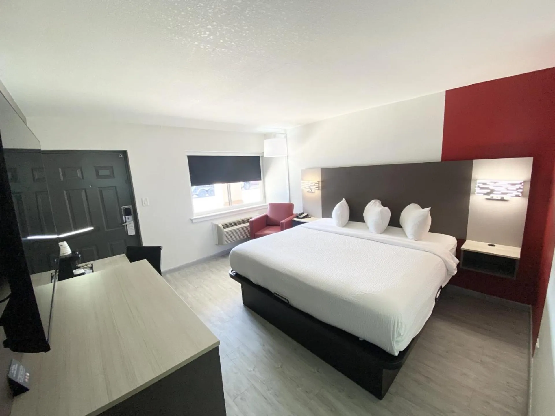 Bed in Ramada by Wyndham Tuscaloosa