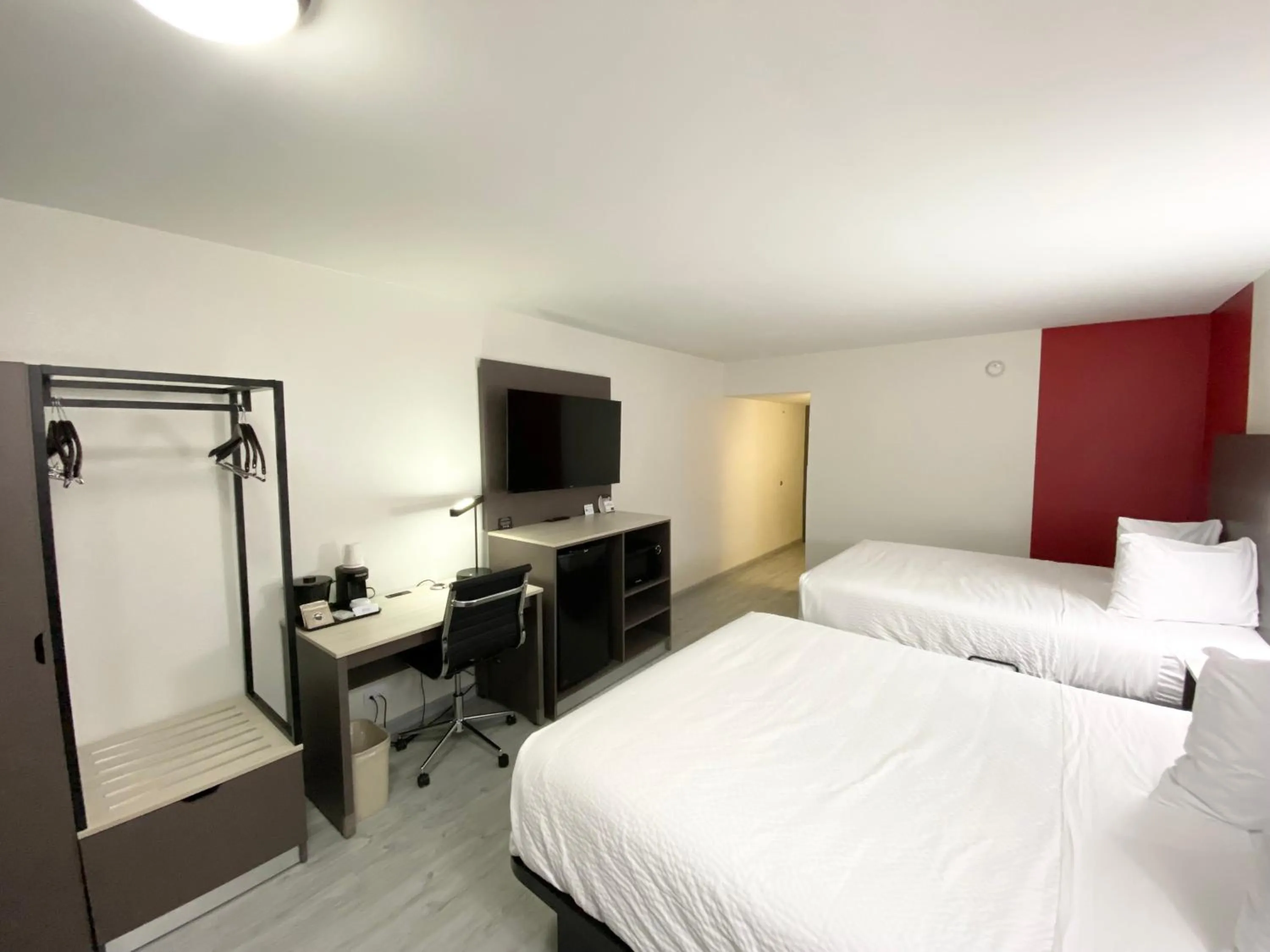 Bed in Ramada by Wyndham Tuscaloosa