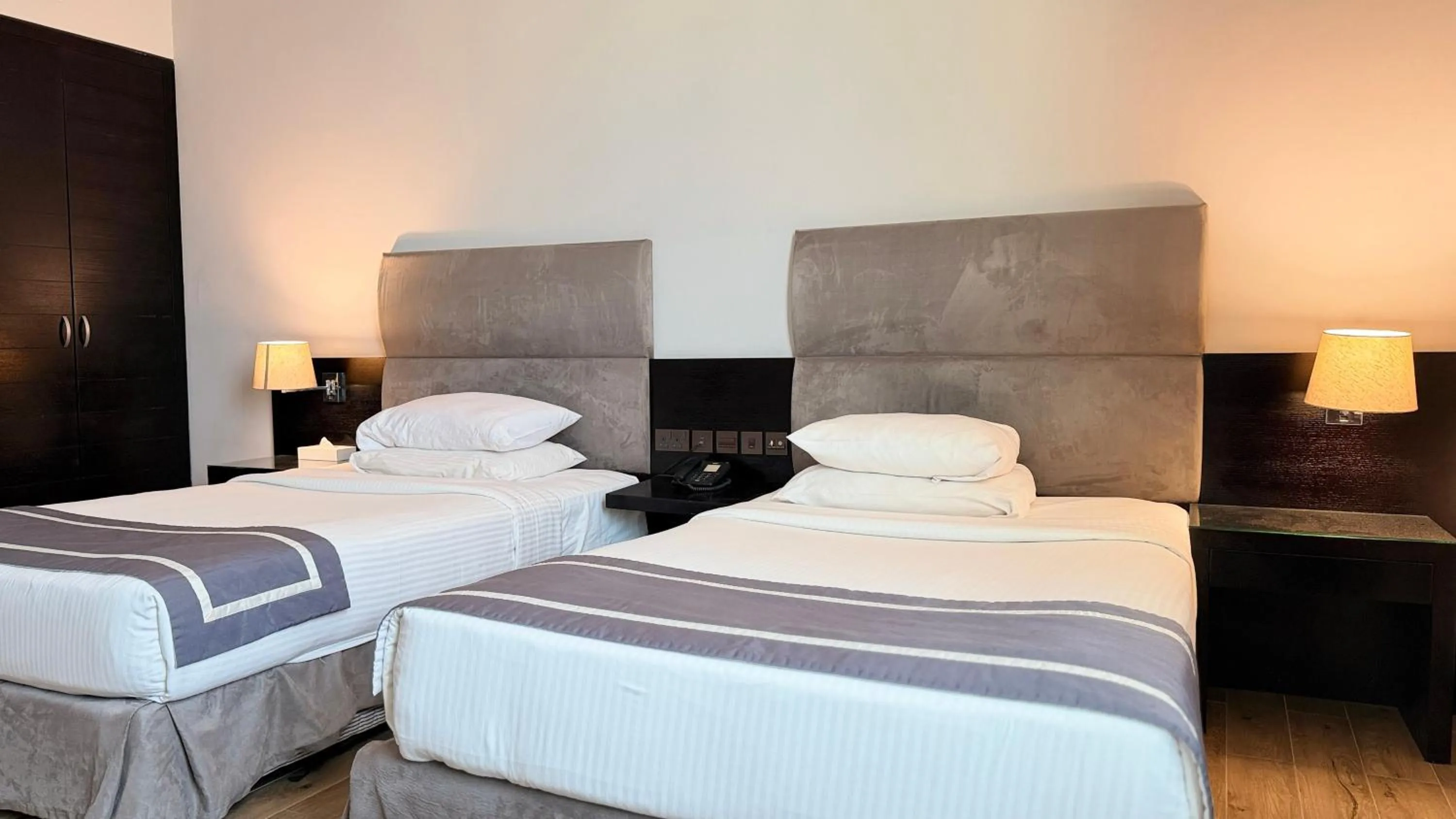 Bed in Sunday Mangrove Corniche Hotel, Ras Al Khaimah