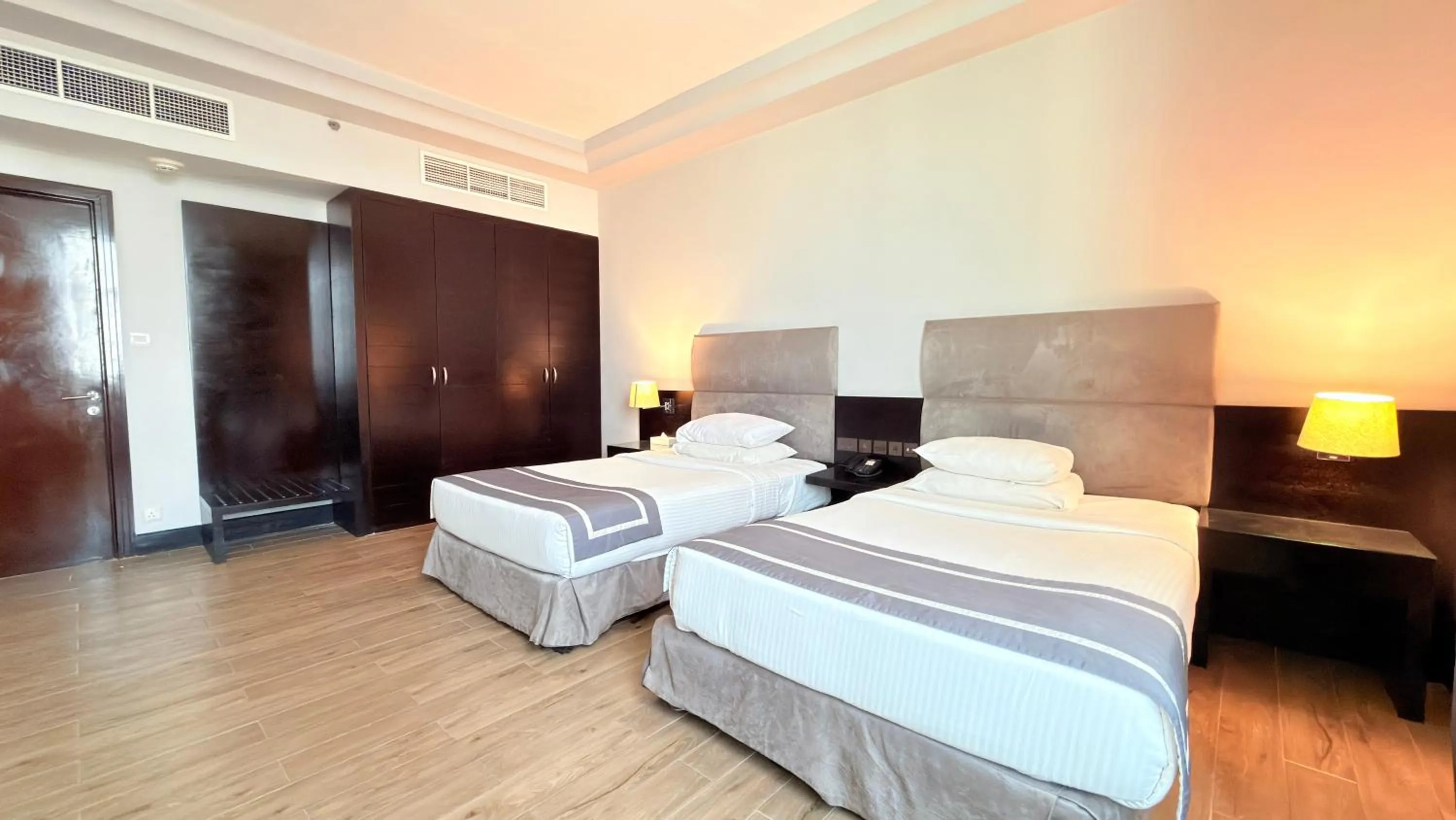 Bed in Sunday Mangrove Corniche Hotel, Ras Al Khaimah