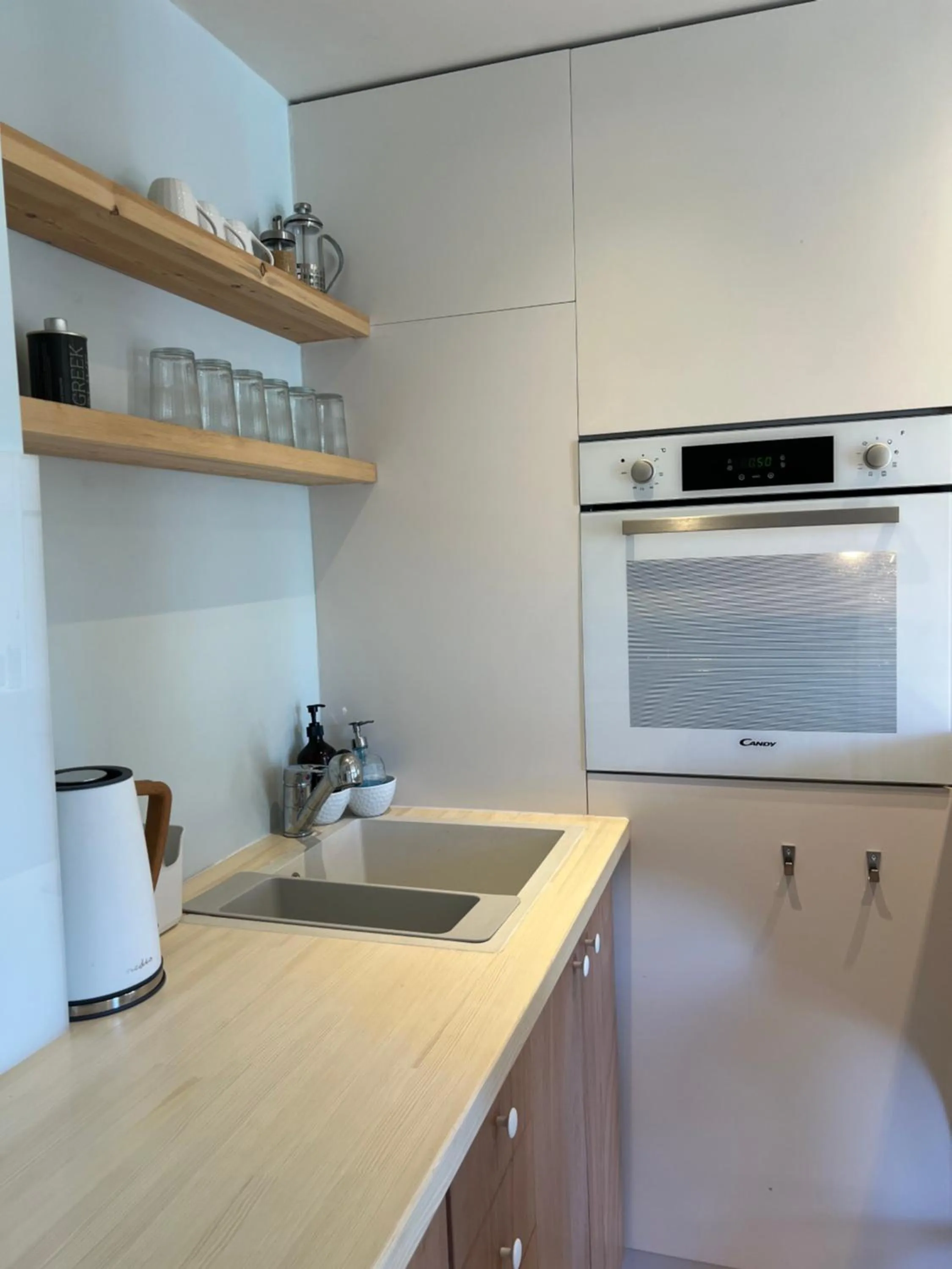 Kitchen or kitchenette in Kapella Apartments