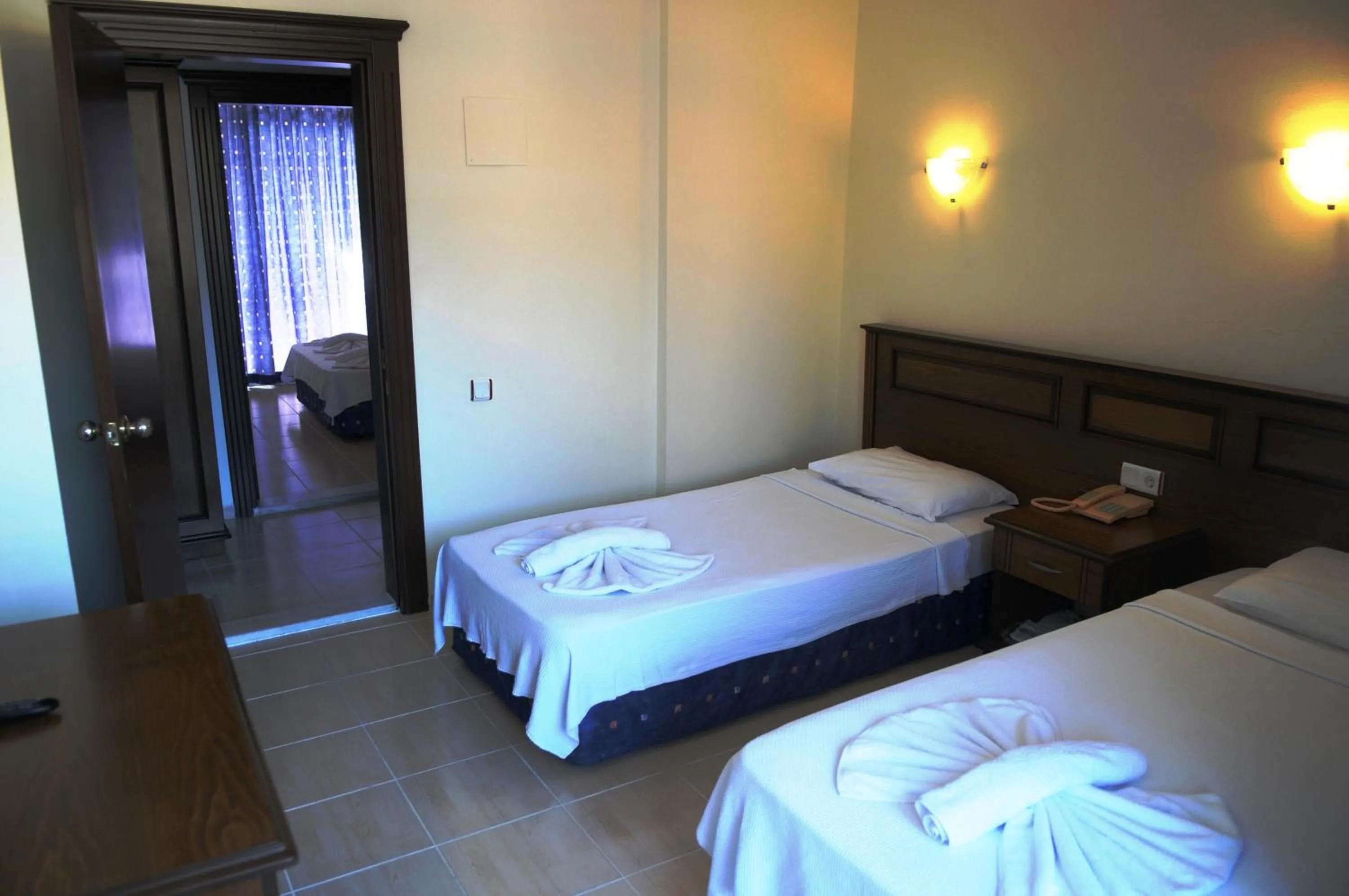 Bathroom, Bed in Navy Hotel