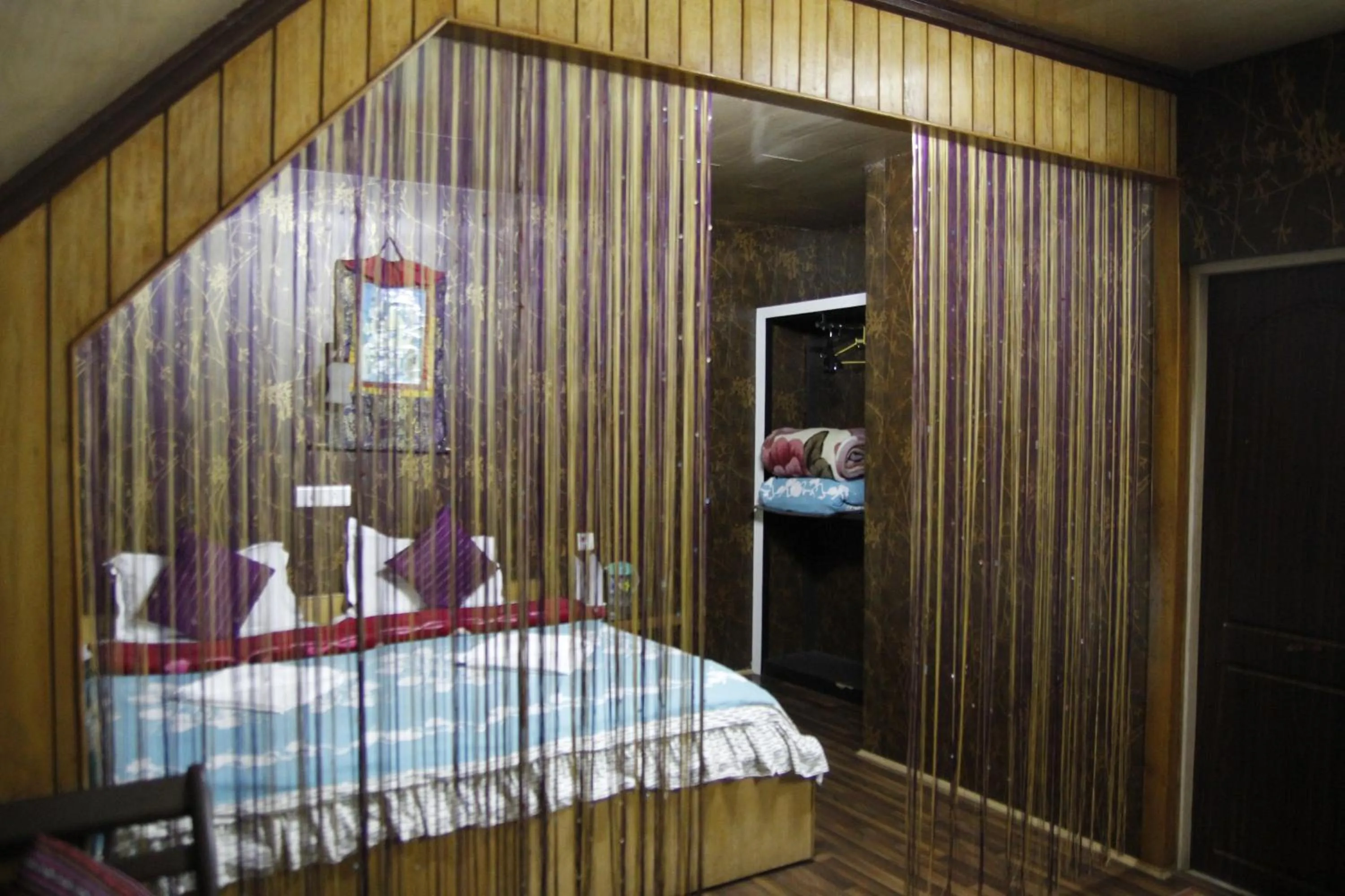 Bedroom, Bed in Mandarin Resort - Kaluk