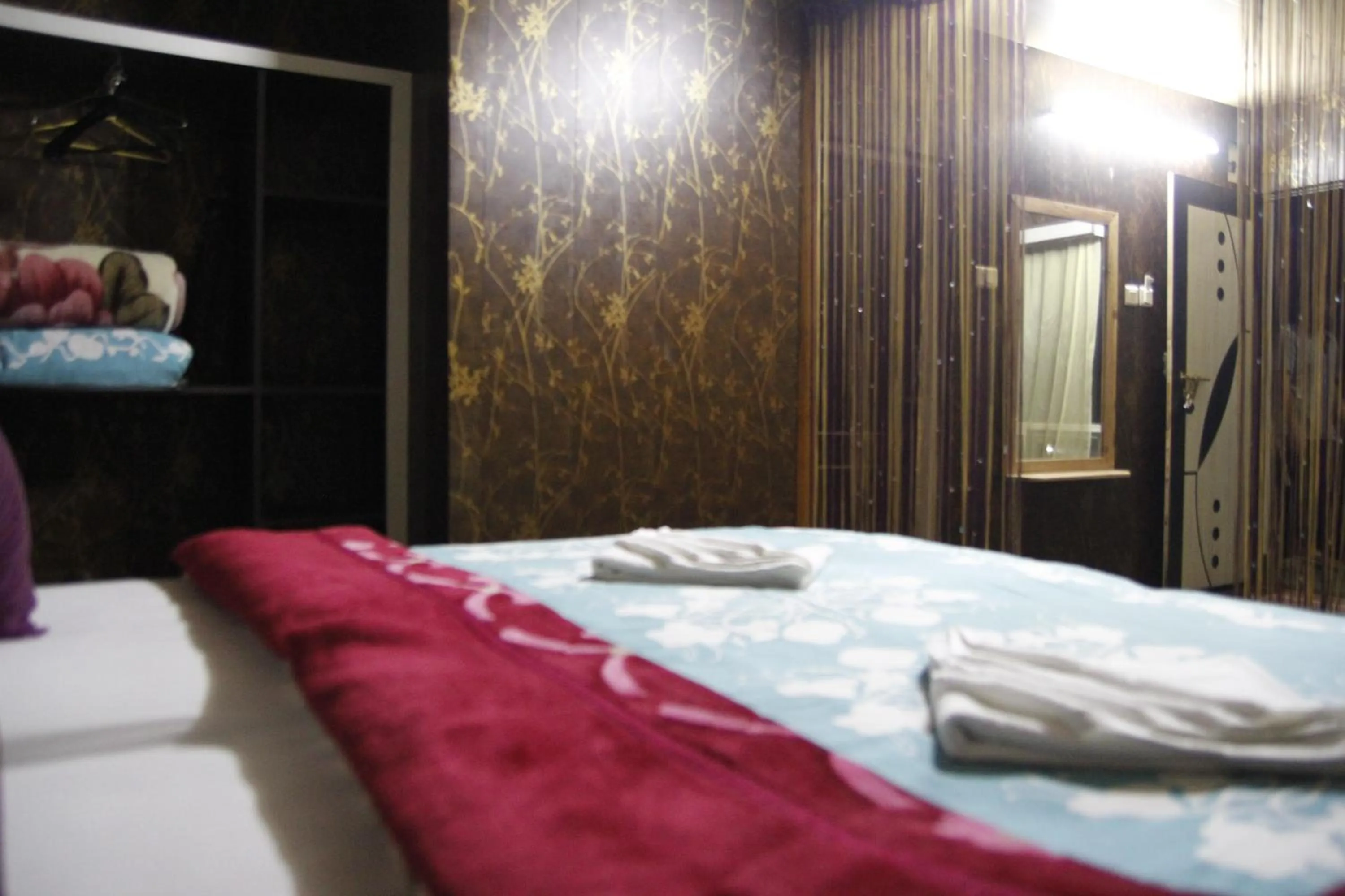 Bedroom, Bed in Mandarin Resort - Kaluk