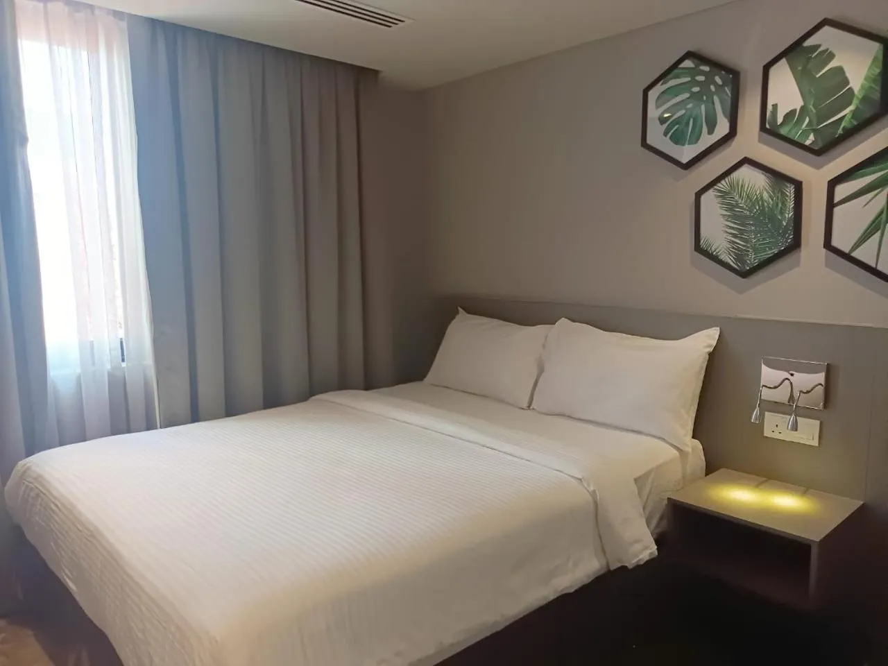Bedroom, Bed in Bahari Parade Hotel Managed by The Ascott Limited