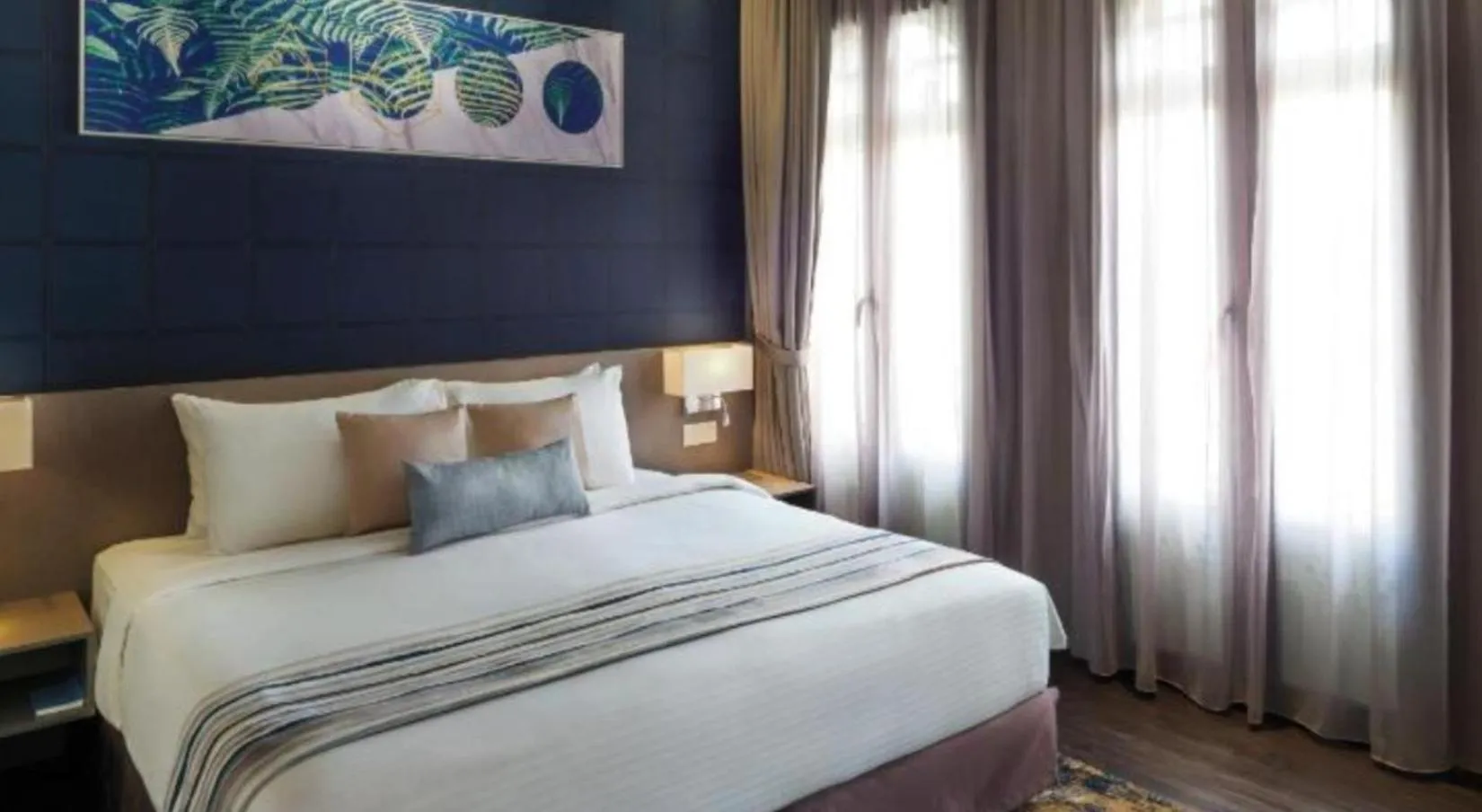 Bed in Bahari Parade Hotel Managed by The Ascott Limited