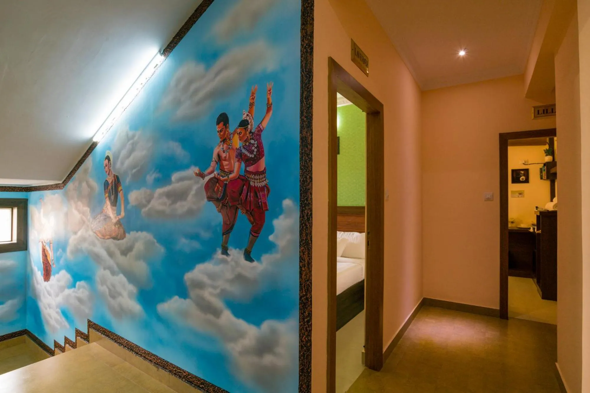 Seating area, Bed in Blue Bell Cochin Airport Hotel