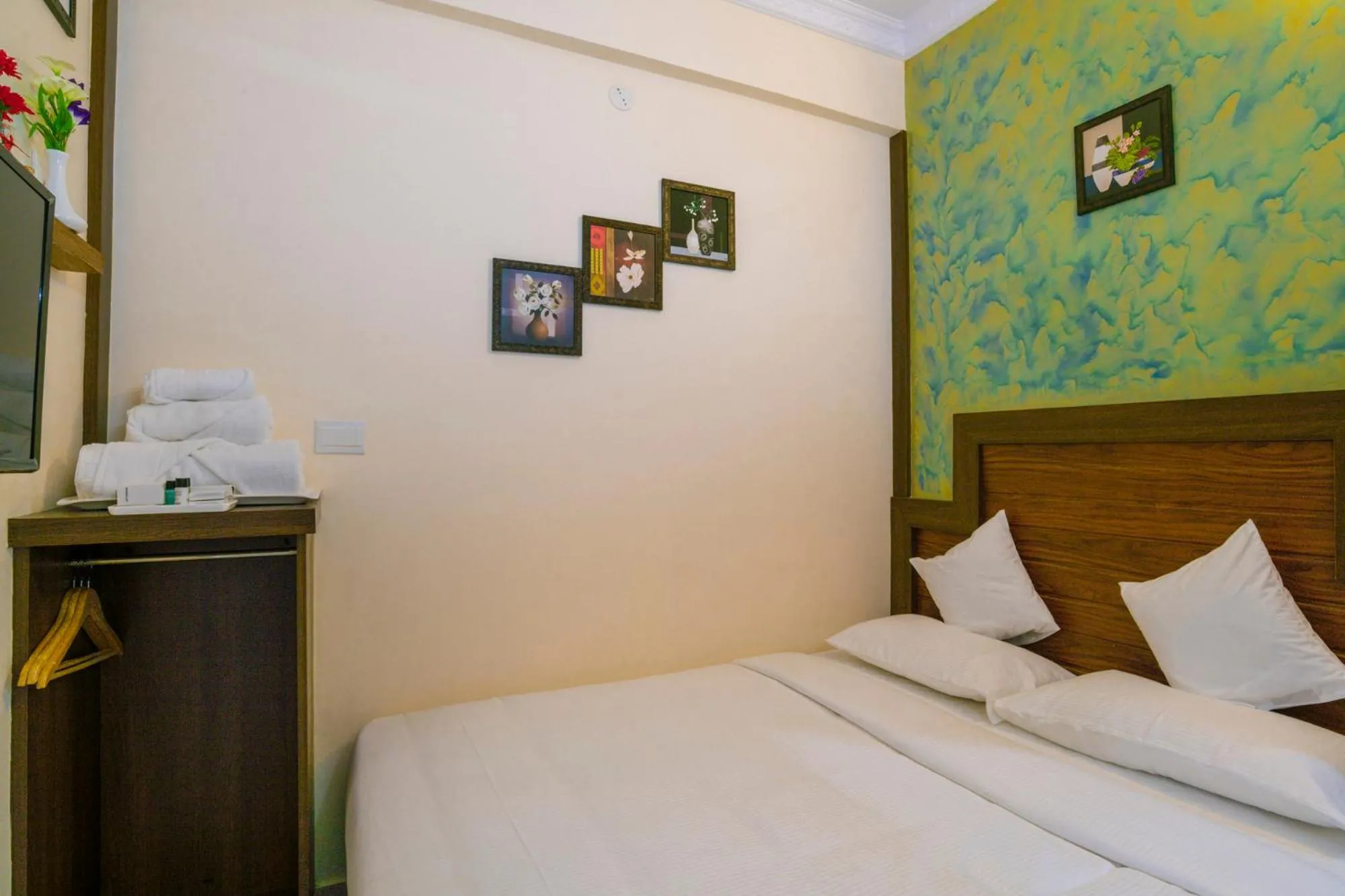 Decorative detail, Bed in Blue Bell Cochin Airport Hotel