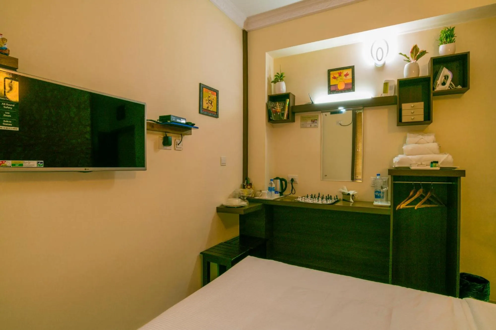 Photo of the whole room, Bed in Blue Bell Cochin Airport Hotel