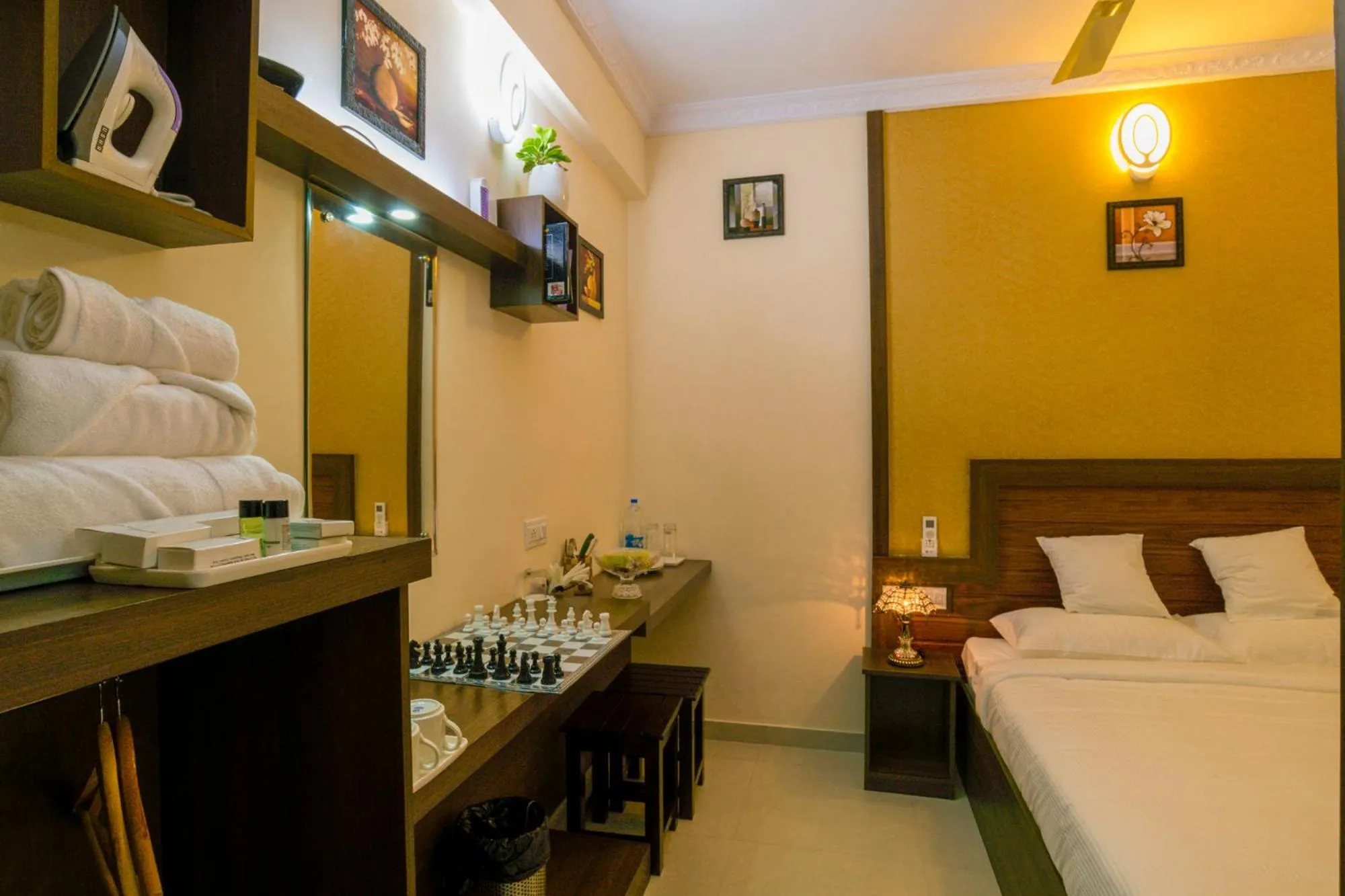 Photo of the whole room, Bed in Blue Bell Cochin Airport Hotel