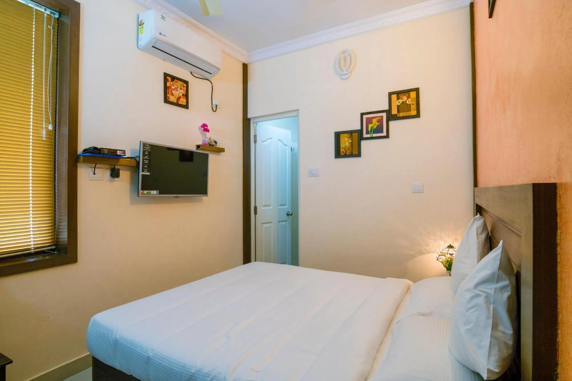 Decorative detail, Bed in Blue Bell Cochin Airport Hotel