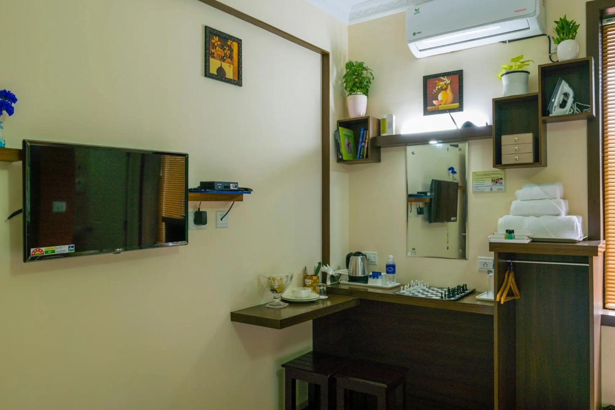 Bedroom in Blue Bell Cochin Airport Hotel