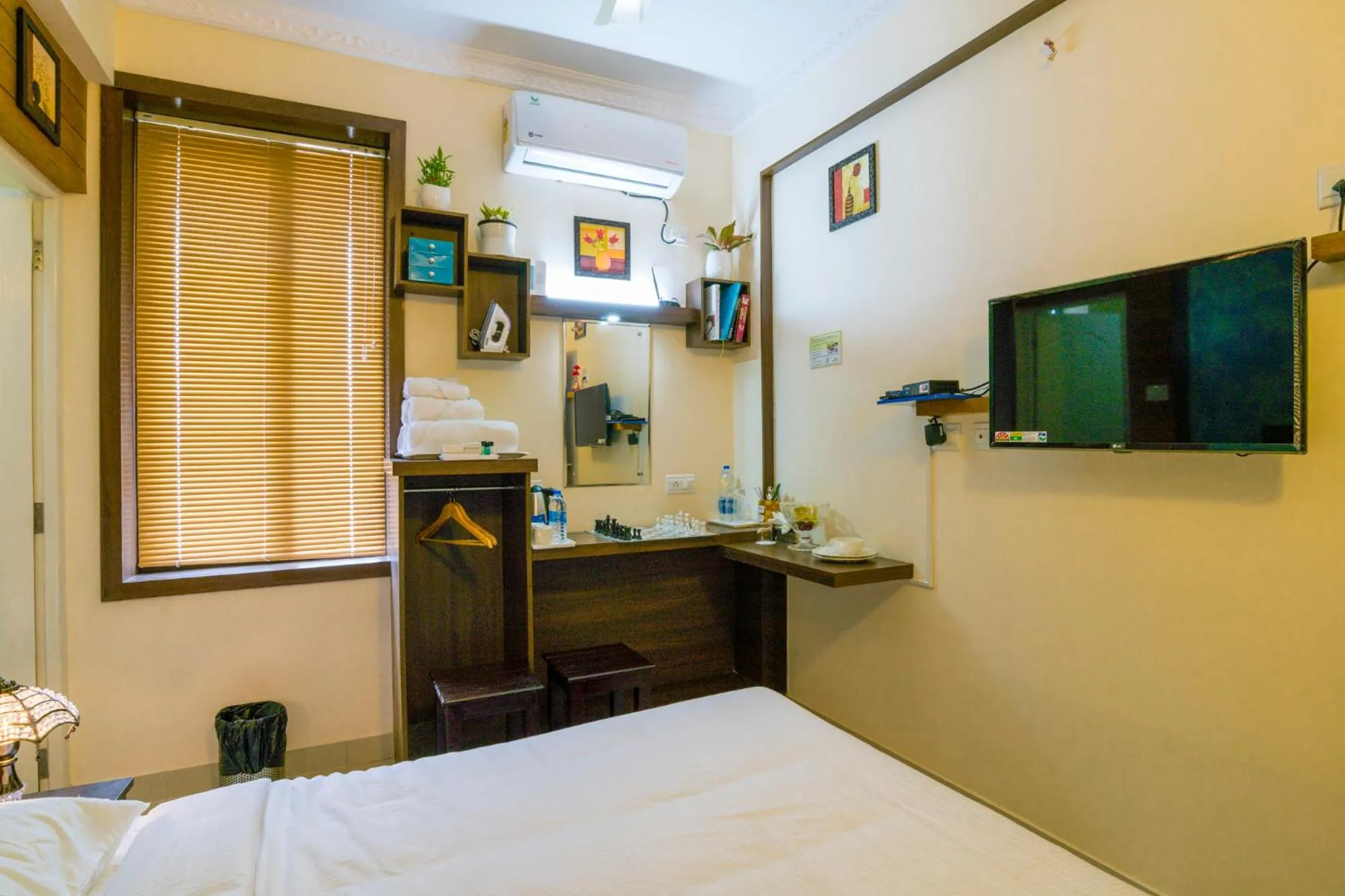 Photo of the whole room, Bed in Blue Bell Cochin Airport Hotel