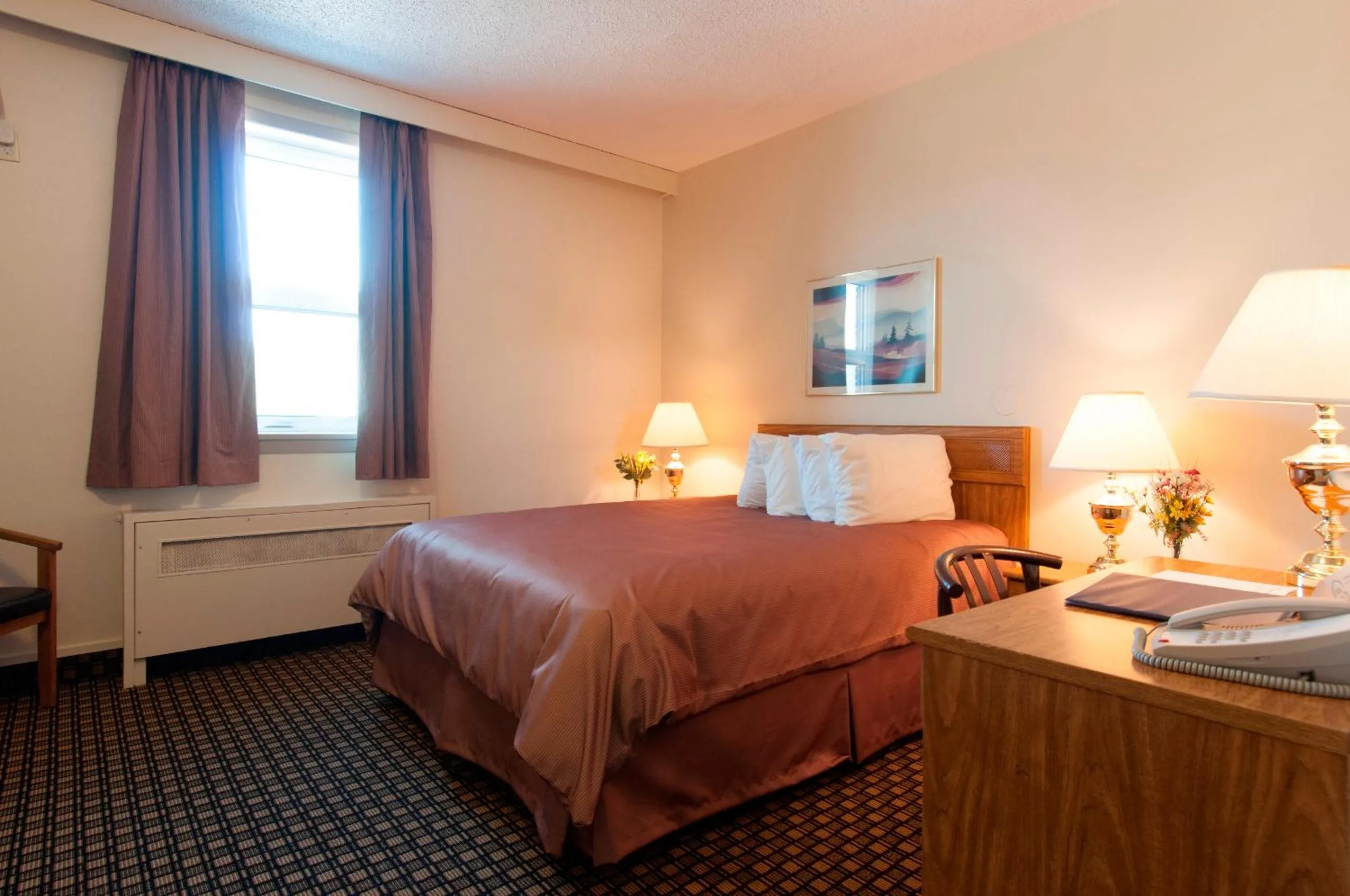 Photo of the whole room, Bed in Assiniboine Gordon Inn on the Park
