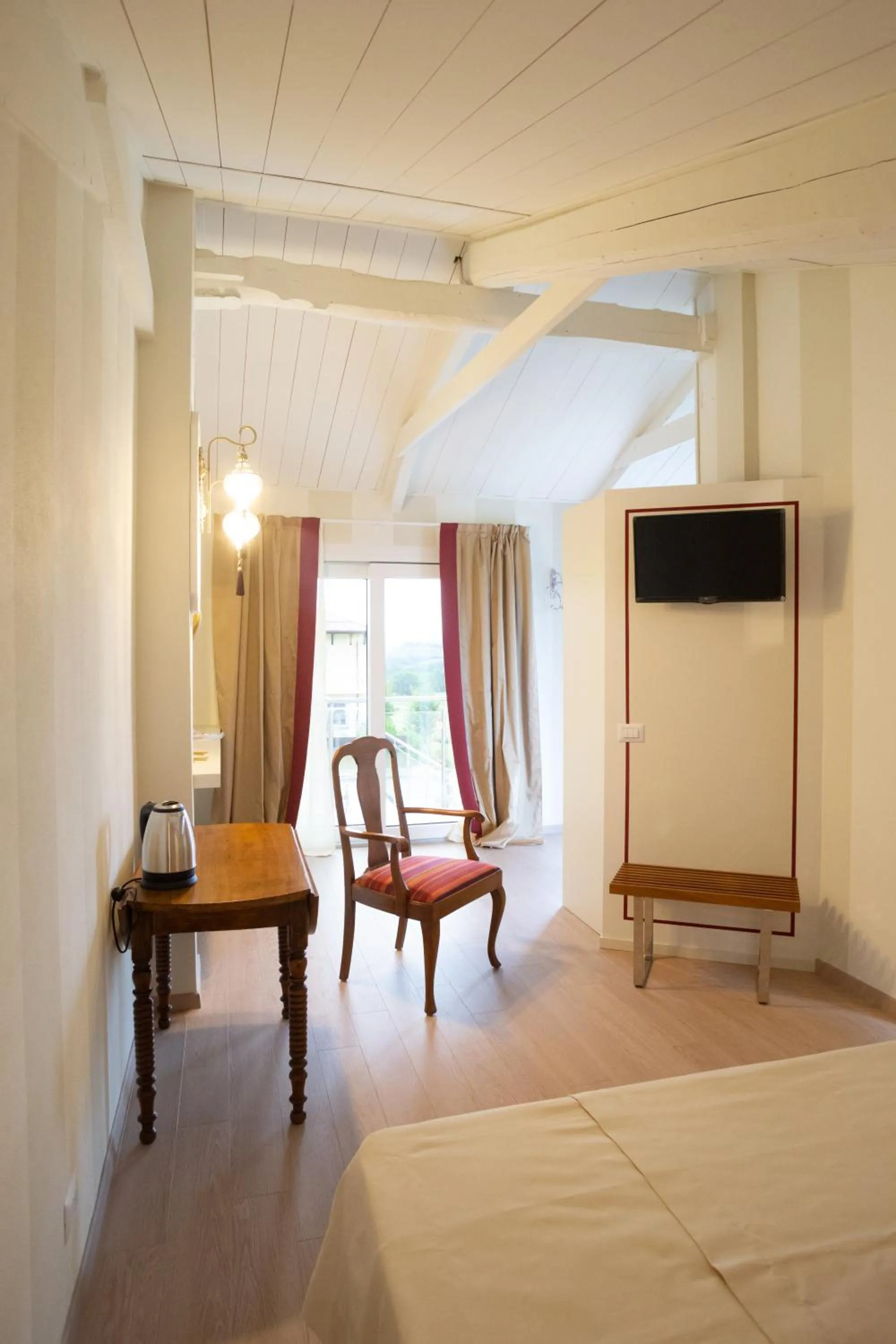 Bed in Maison Petit Perlage B&B and Champagne