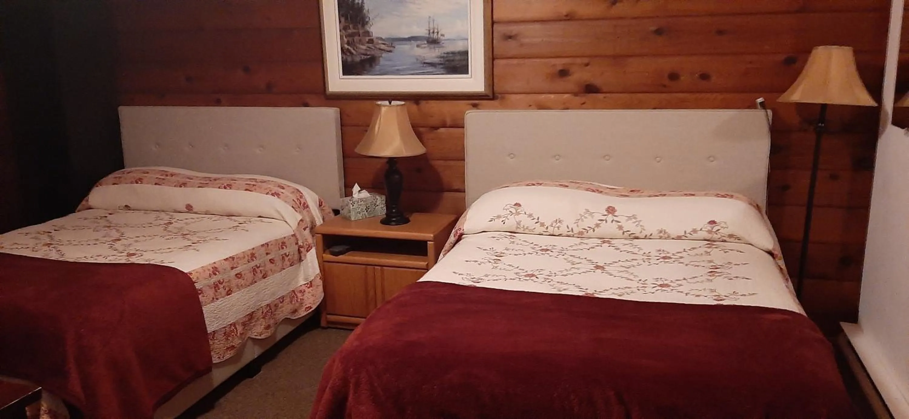 Bed in Alert Bay Lodge