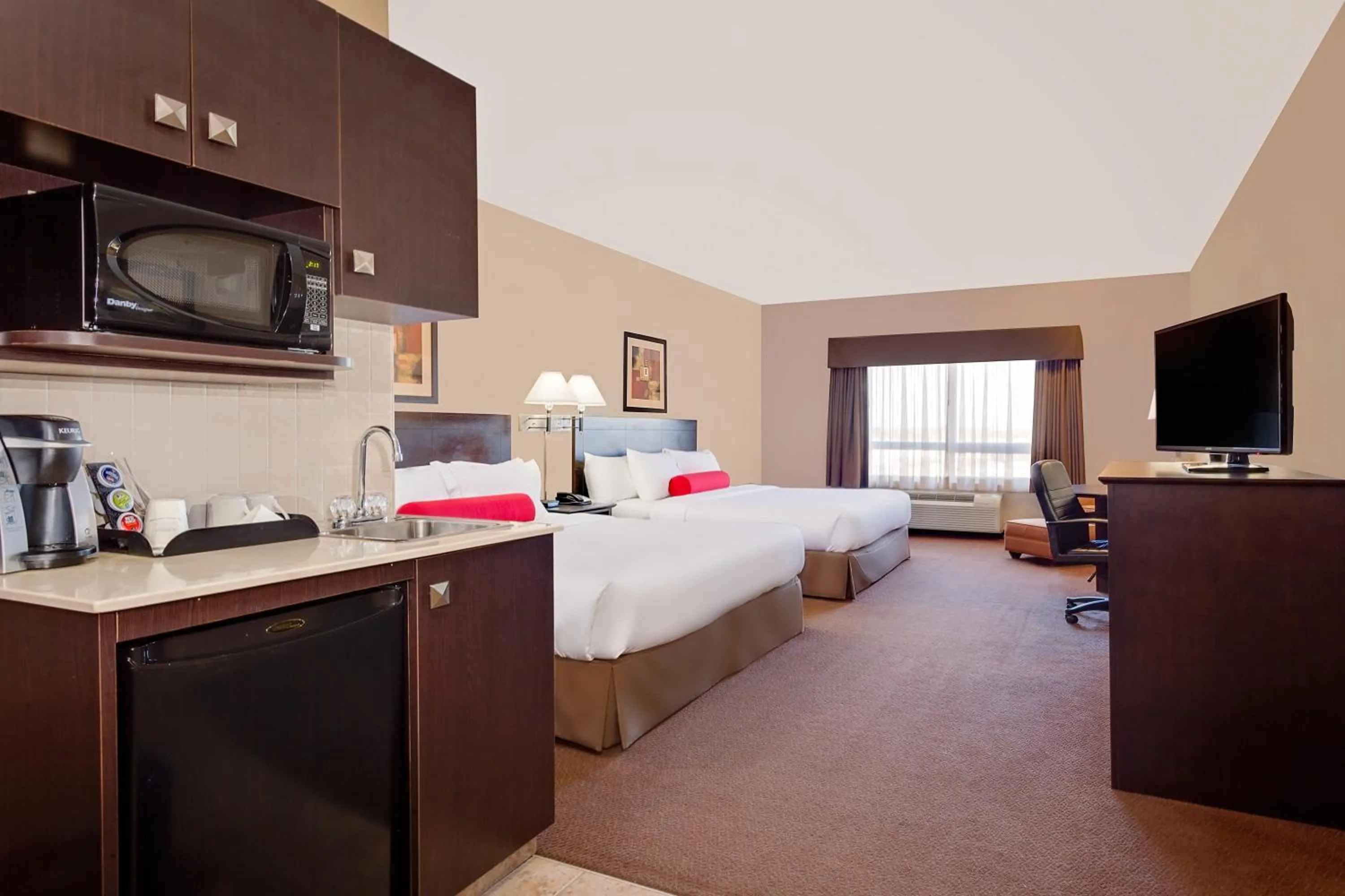 Bed in Ramada by Wyndham Stettler