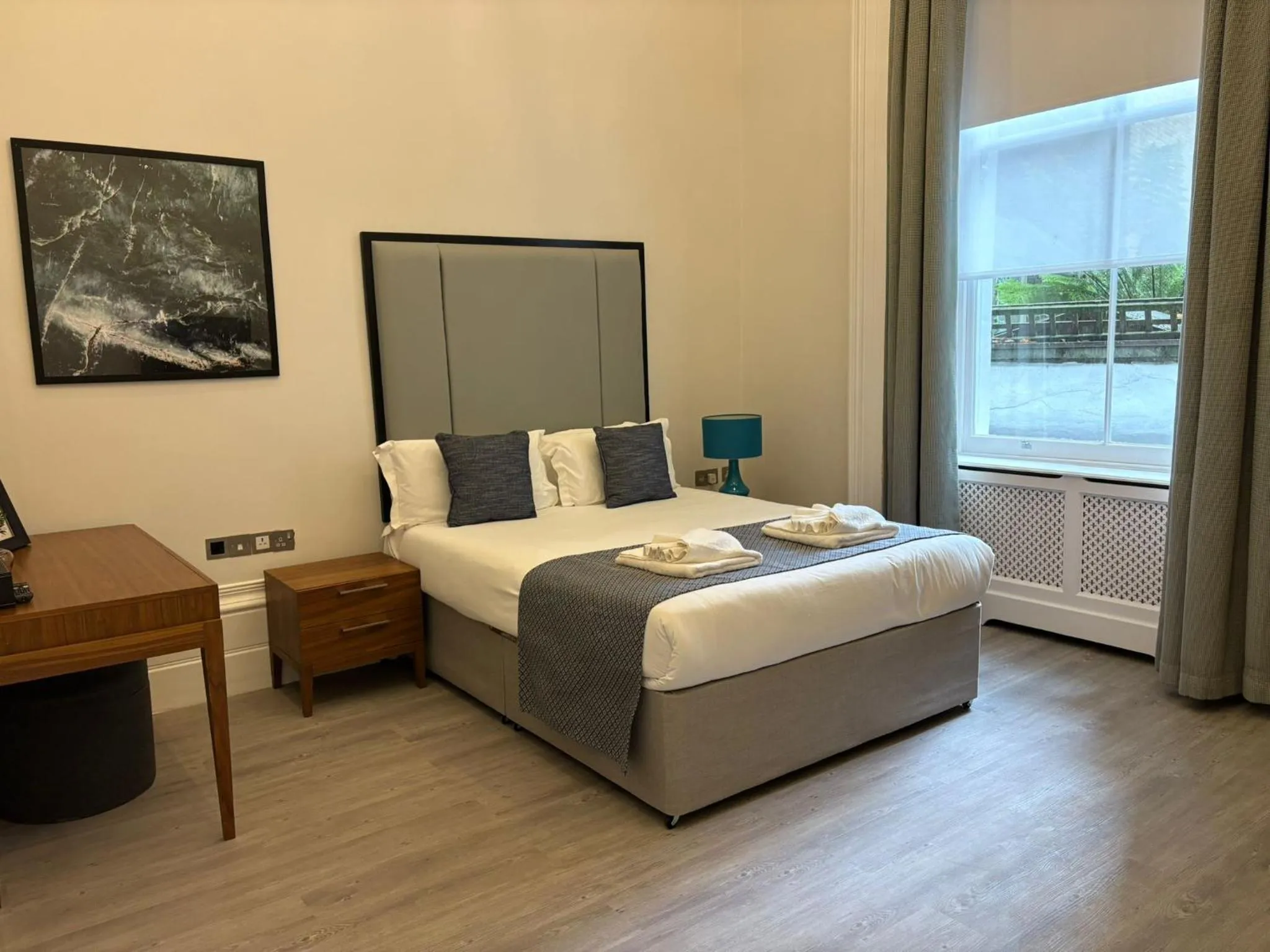 Bed in Commodore Hotel