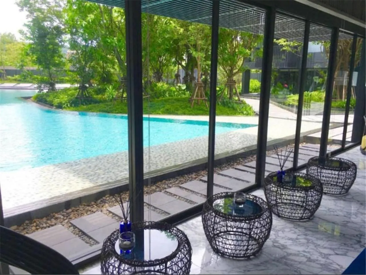 Communal lounge/ TV room in The Deck Patong by VIP