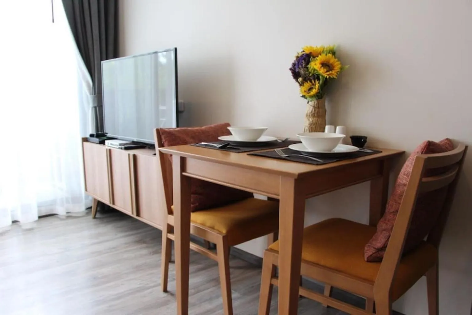 Living room in The Deck Patong by VIP