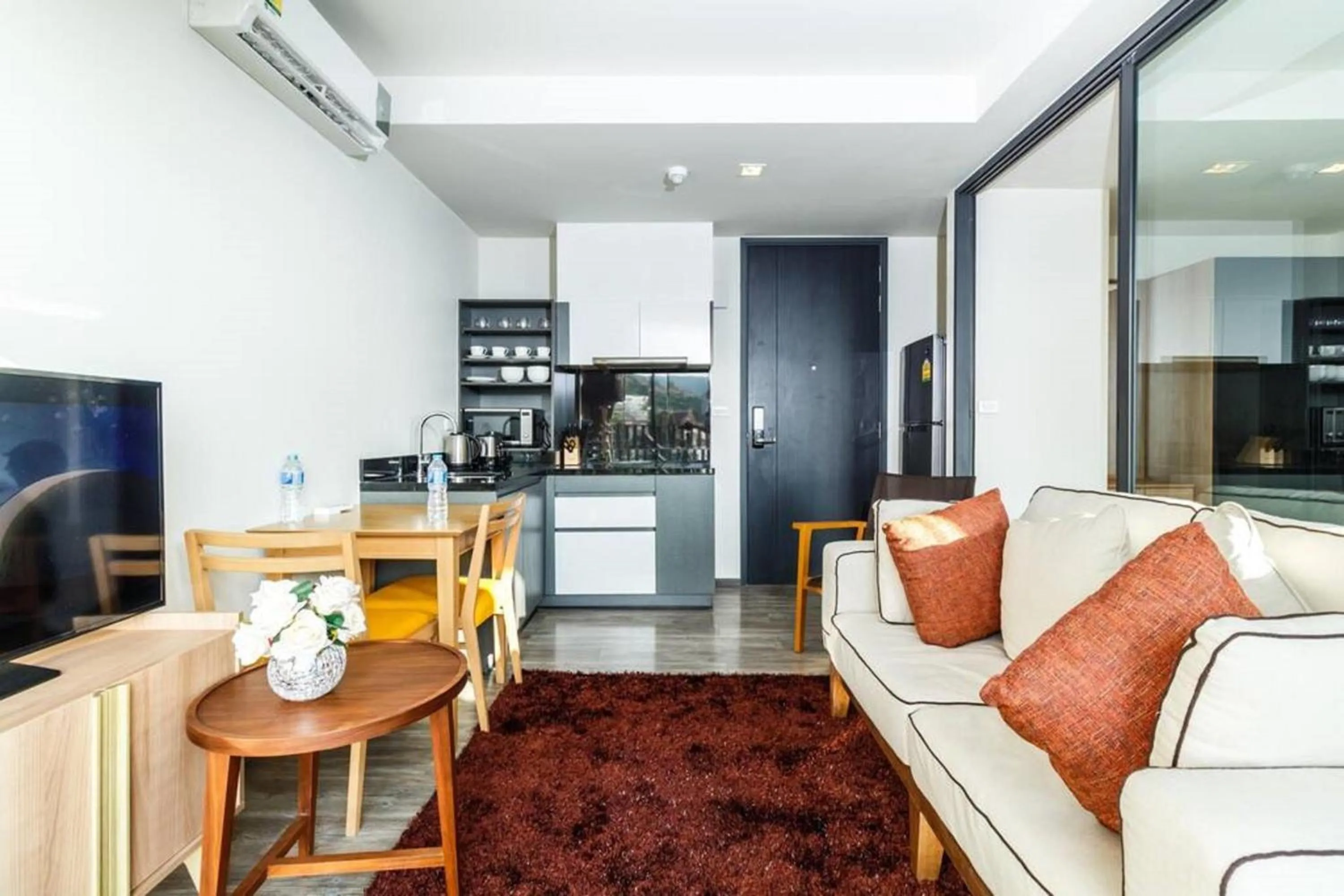 Living room in The Deck Patong by VIP