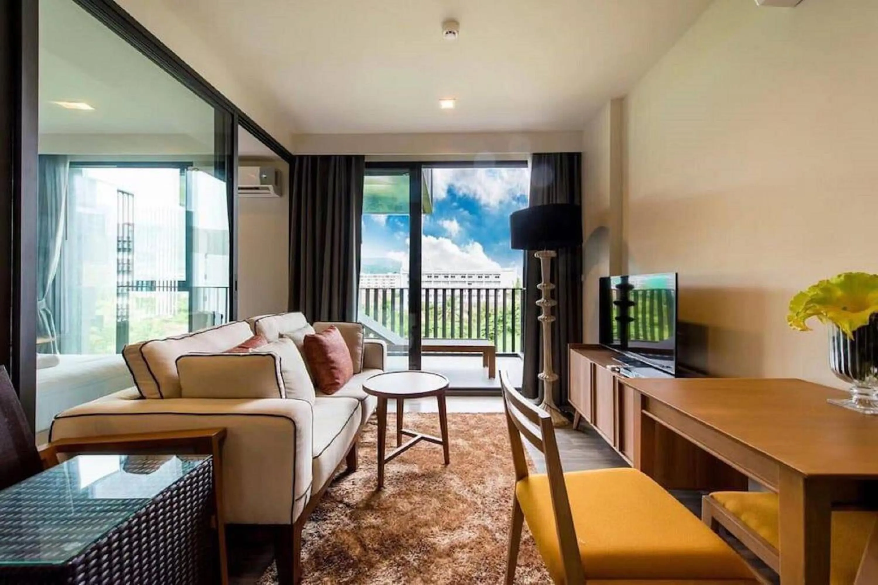 Living room in The Deck Patong by VIP