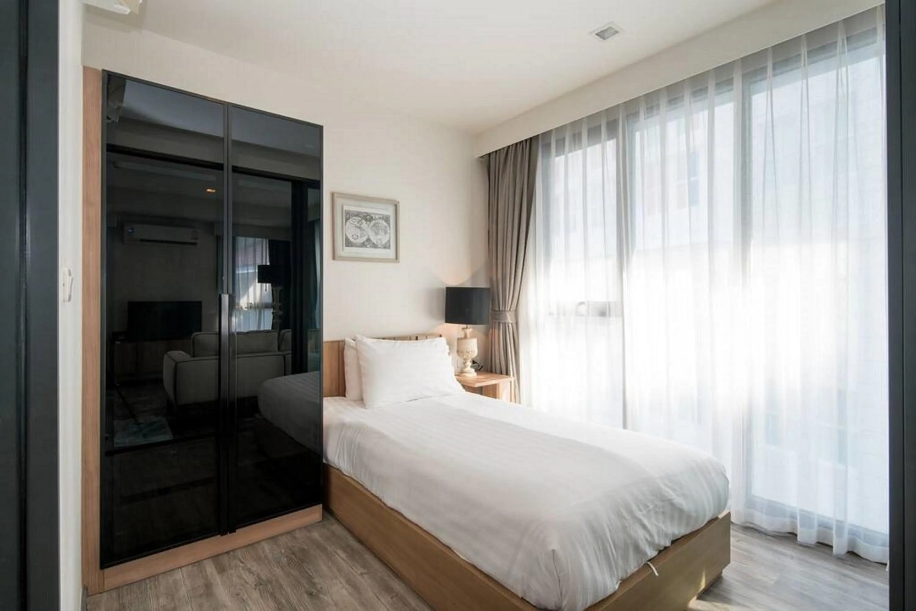 Photo of the whole room, Bed in The Deck Patong by VIP