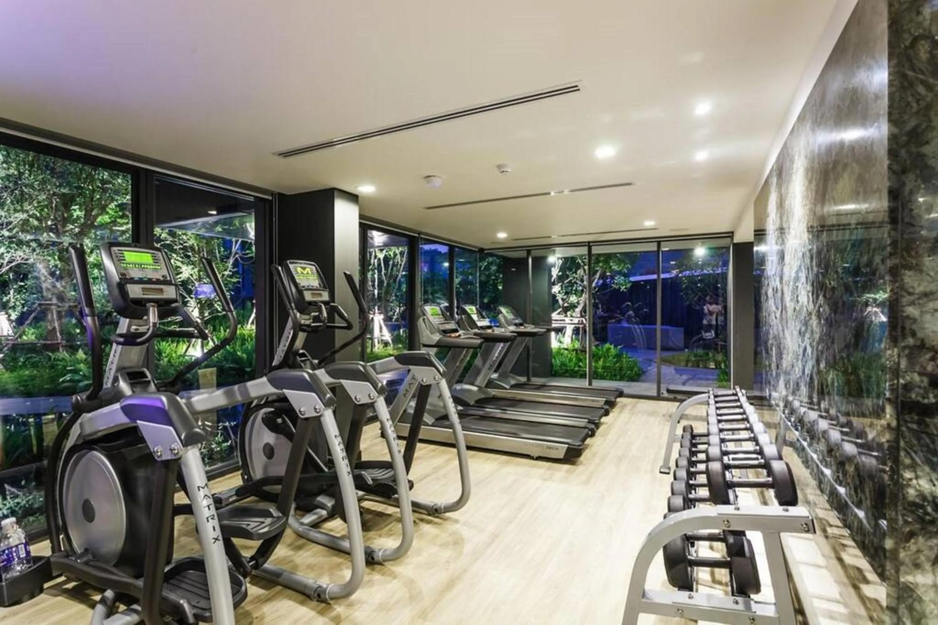 Fitness centre/facilities in The Deck Patong by VIP