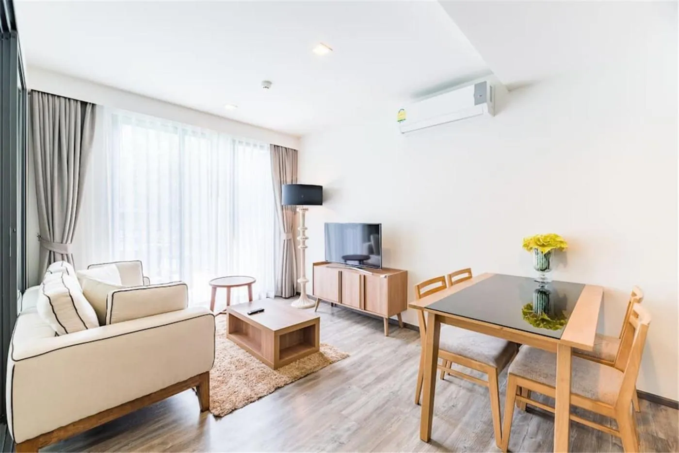 Living room in The Deck Patong by VIP