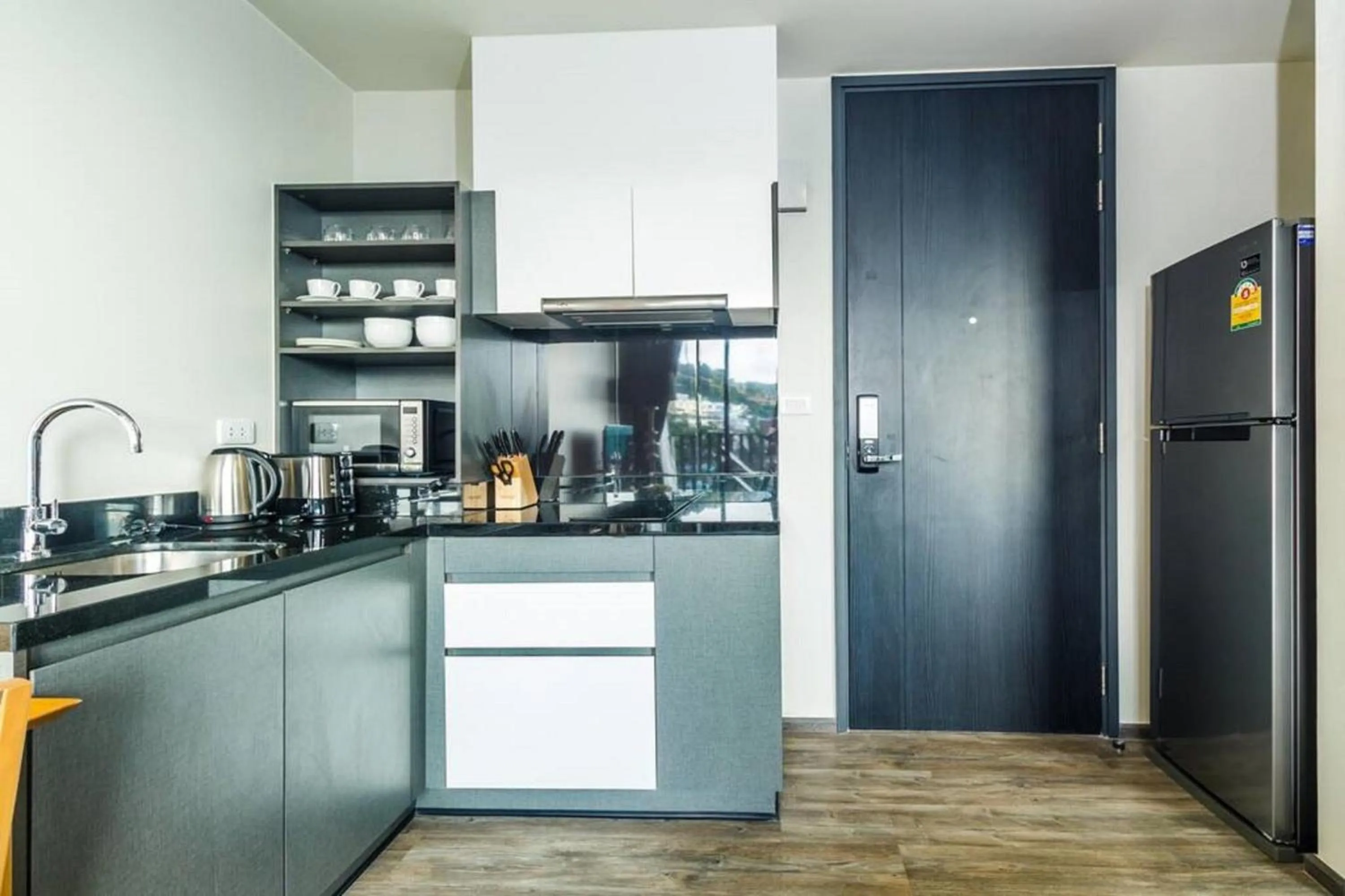 Kitchen or kitchenette in The Deck Patong by VIP