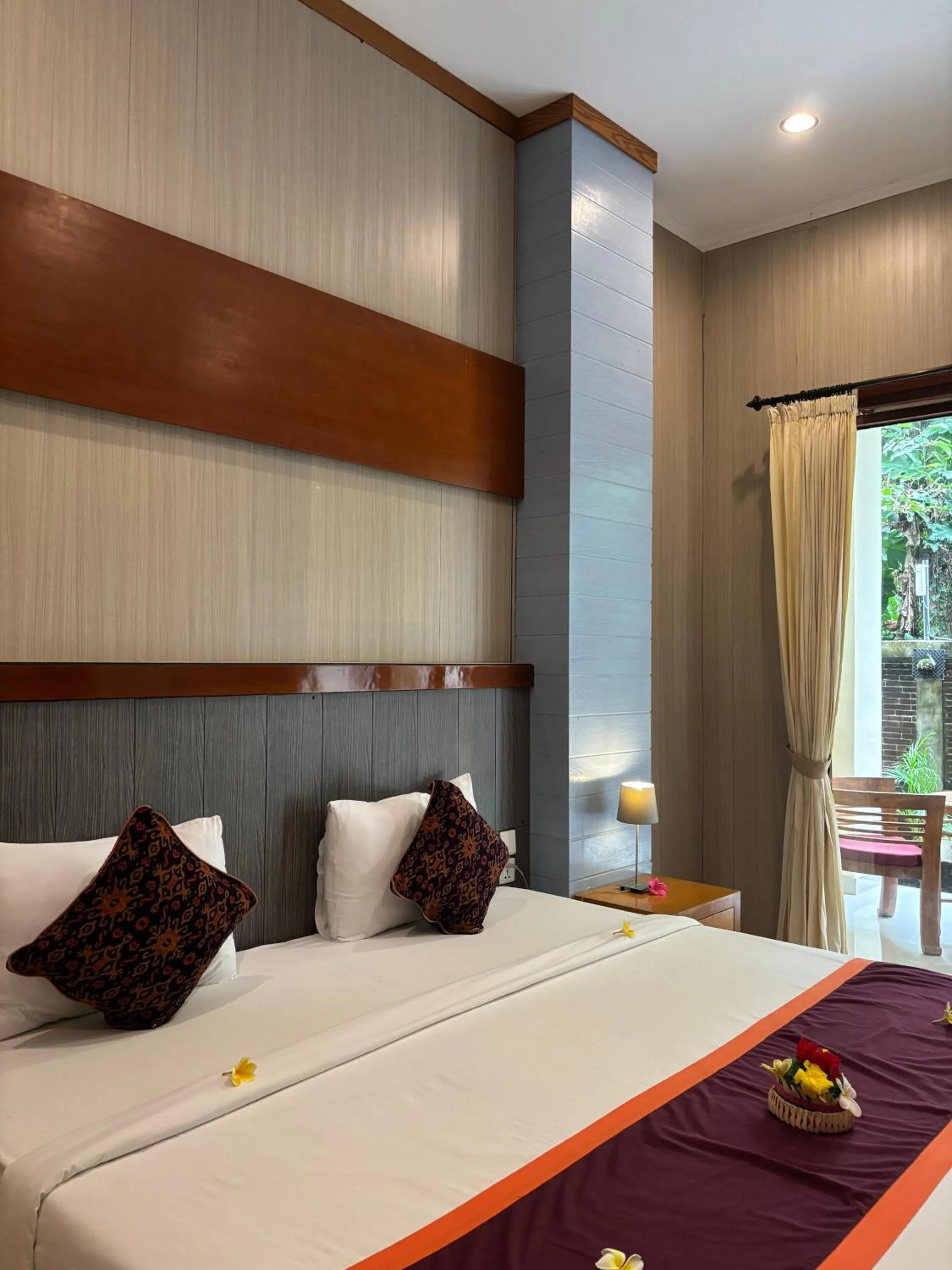 Bed in Adi Jaya Cottages Ubud Suites by EPS - CHSE Certified